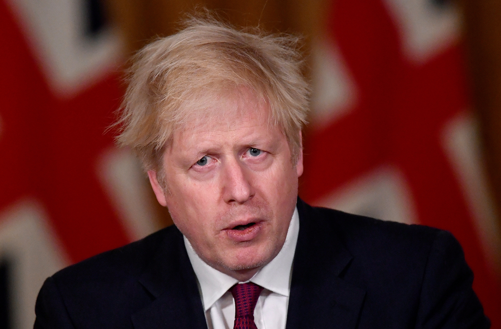 Britain's Prime Minister Boris Johnson speaks during a news conference inside 10 Downing Street in London, on December 19.