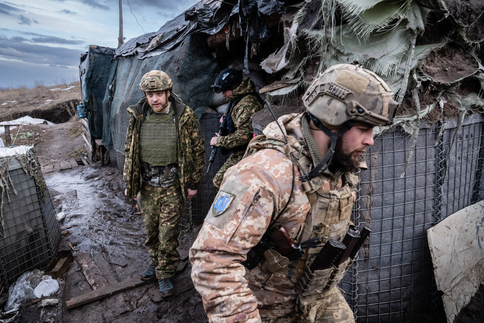 Ukraine's Interior Minister Denys Monastyrskiy, left, visits soldiers at a front line position in Novoluhanske, Ukraine, on February 19. (Timothy Fadek/Redux for CNN)