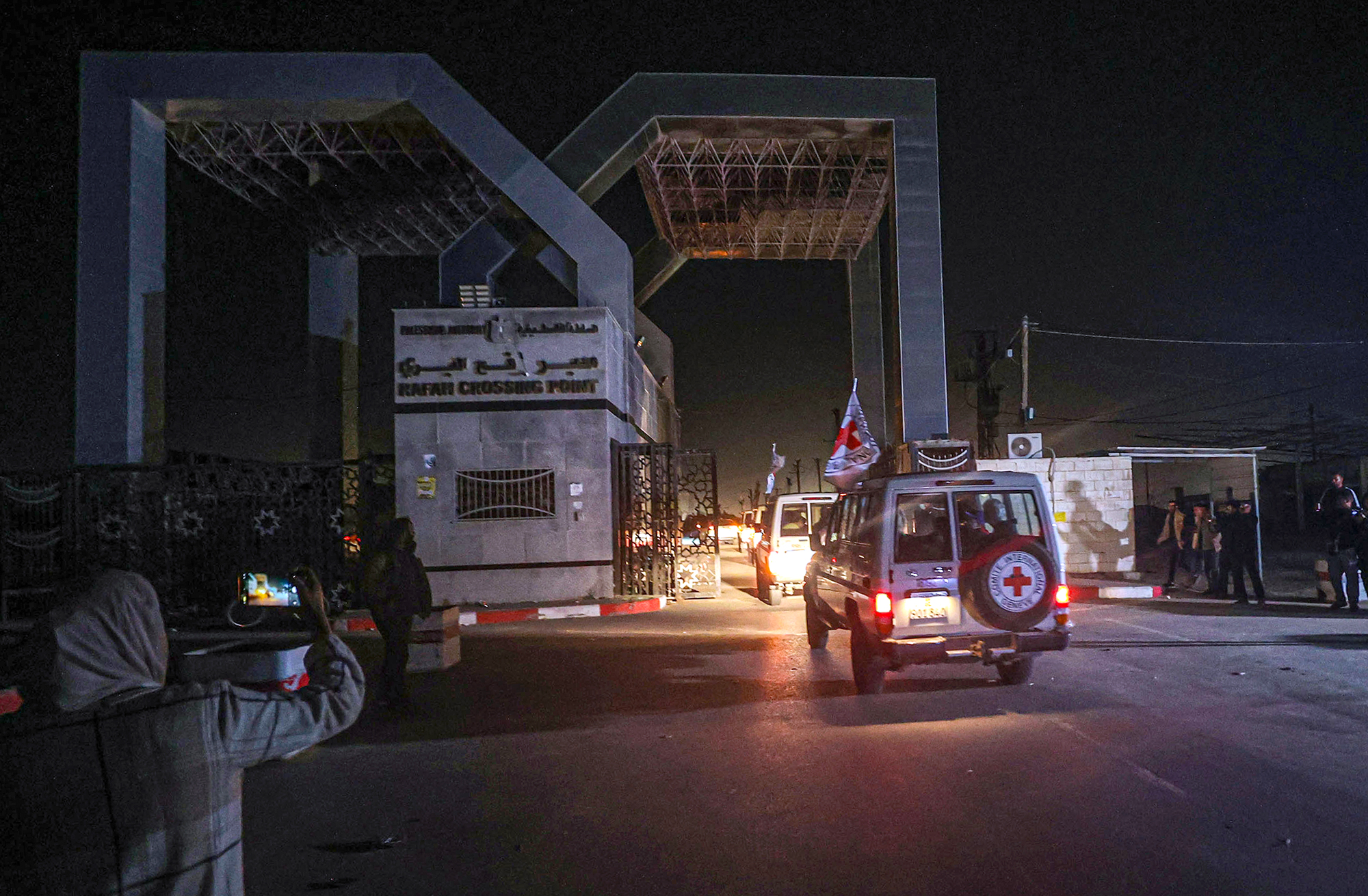 International Red Cross vehicles transport freed hostages through the Rafah border crossing in Gaza on November 24. 