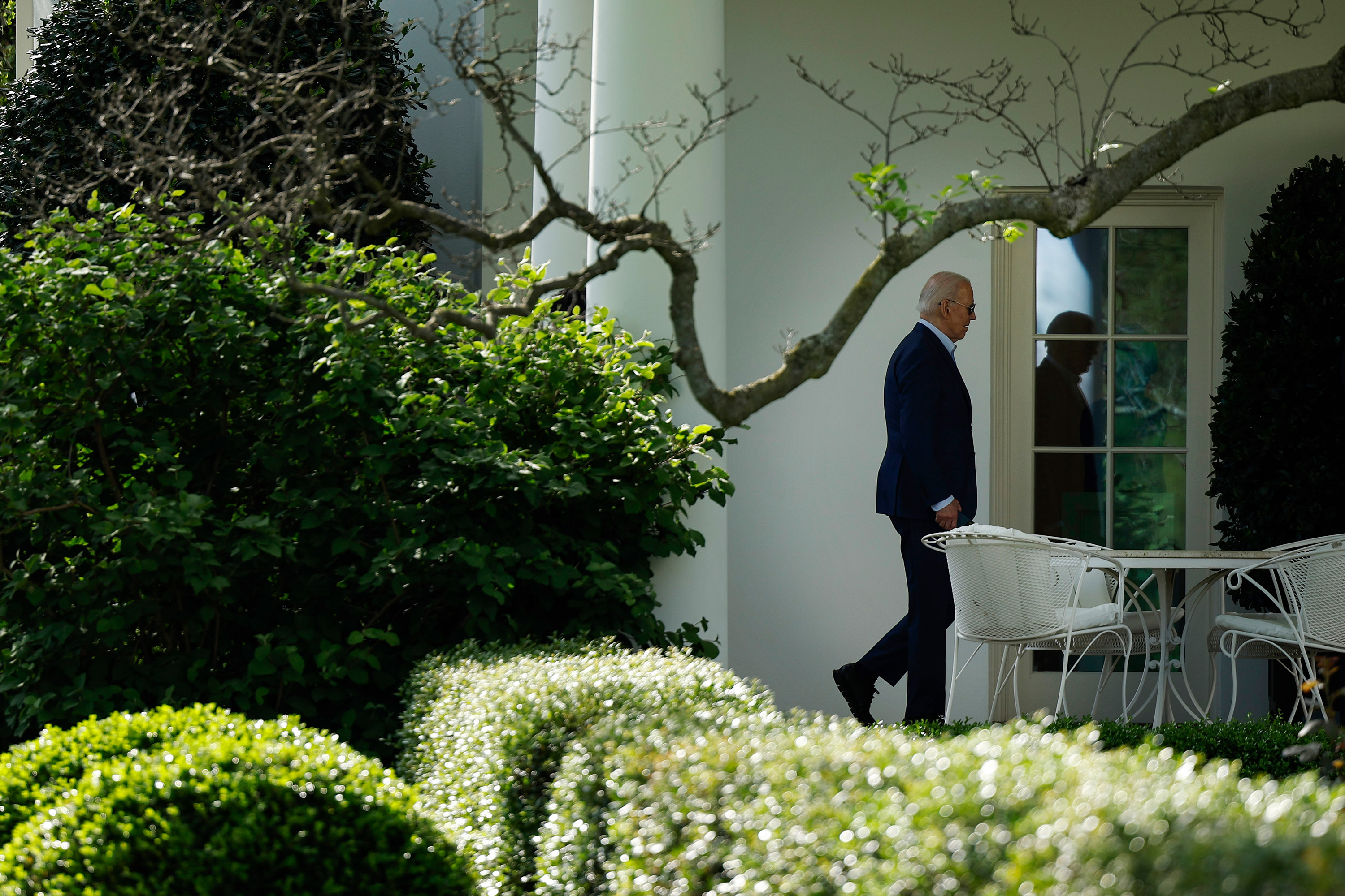 President Joe Biden walks to the Oval Office on April 18.