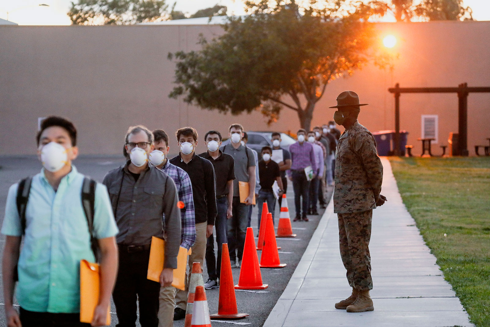 US Marine Corps recruits wait in line for health screenings at the Marine Corps Recruit Depot in San Diego, California.