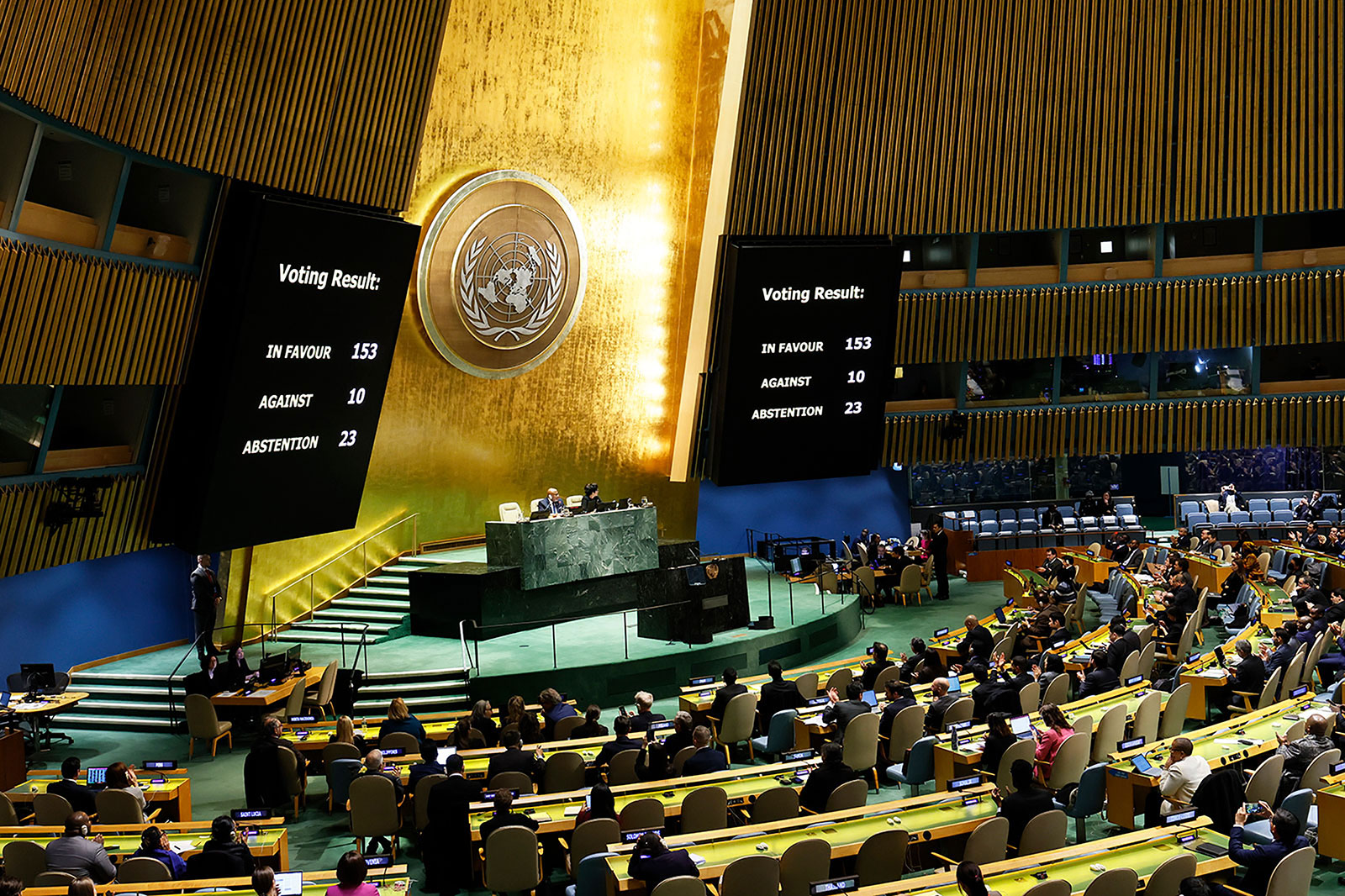 The results of a draft resolution vote are seen on a screen as the UN General Assembly holds an emergency special session on the Israel-Hamas war at the United Nations headquarters on December 12.