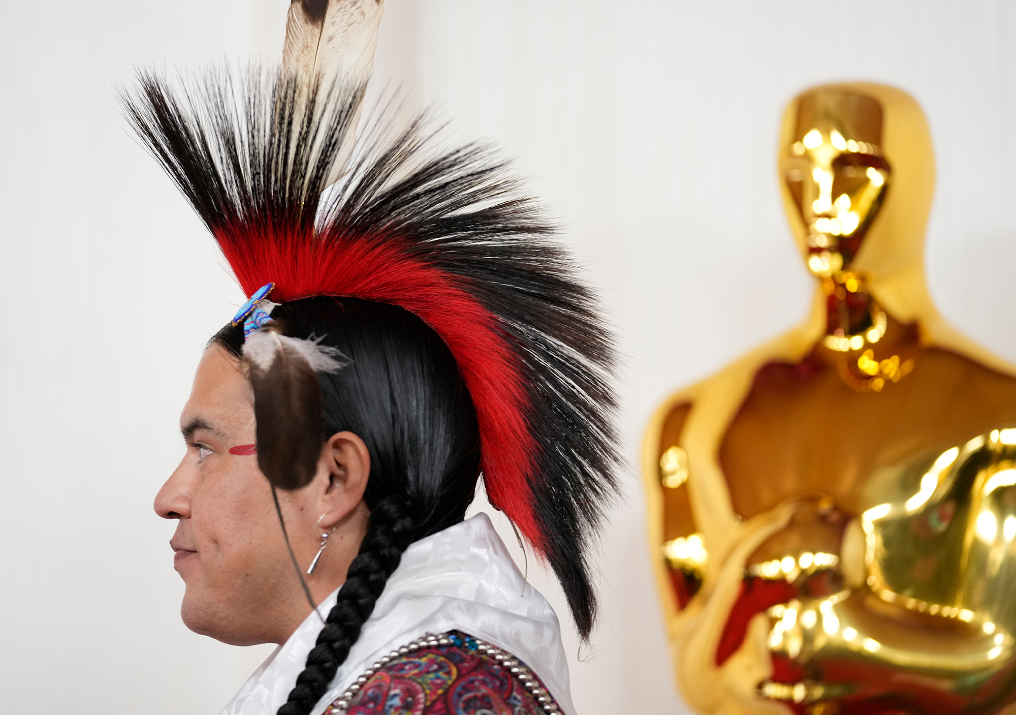 An Osage Nation member walks the red carpet. 