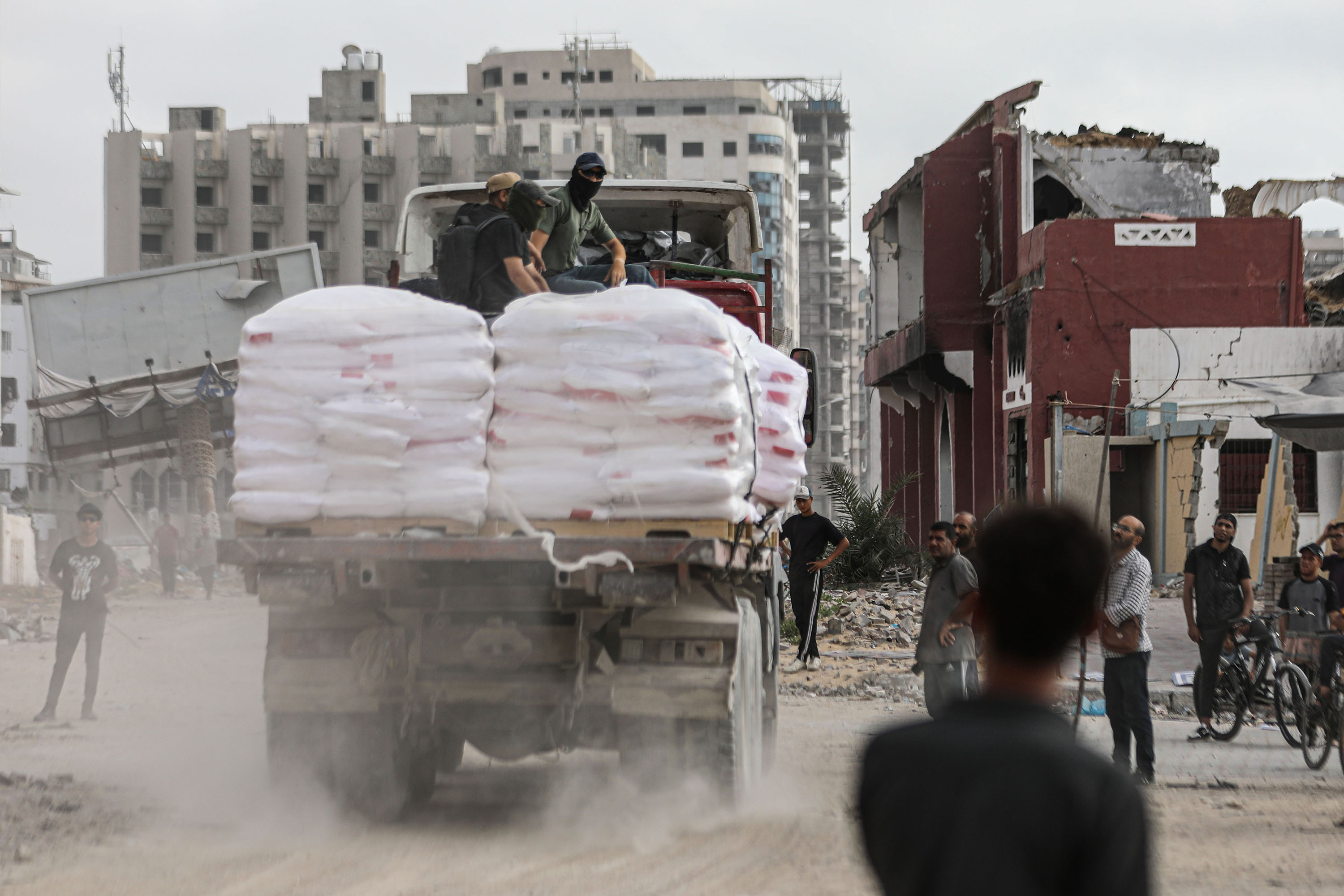 Aid trucks carrying food supplies and humanitarian aid arrive in Gaza via Beit Lahiya, north of Gaza City, on May 27.