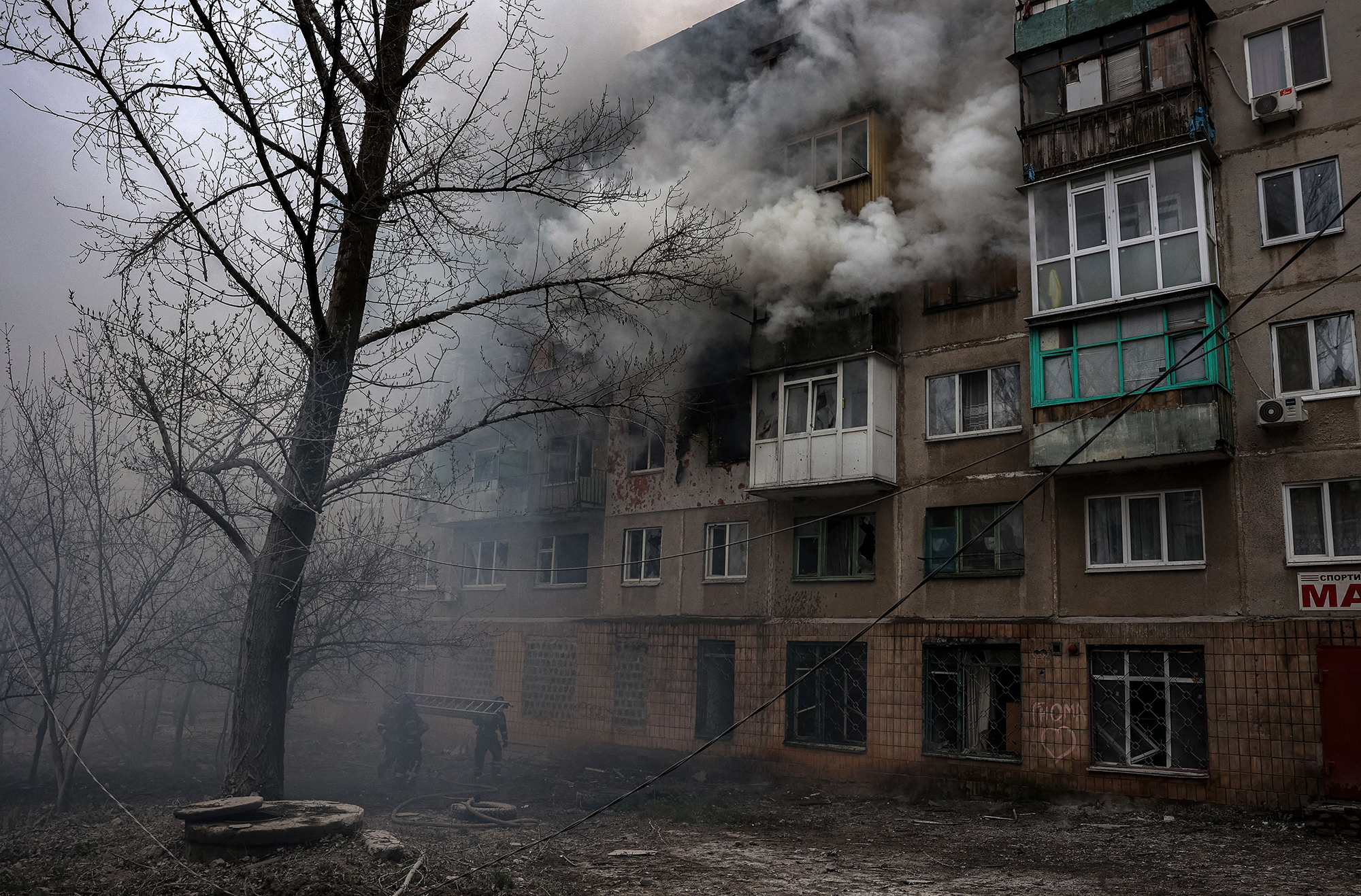 Firefighters work at the site of a burning residential building after shelling in Sloviansk, Ukraine, on April 14. 