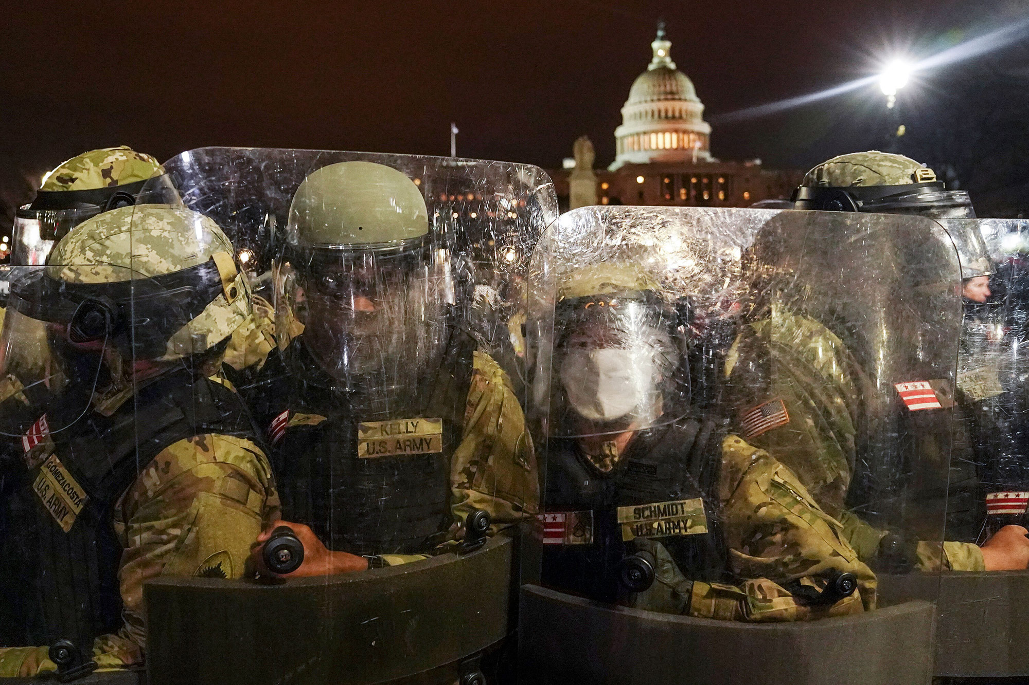 DC National Guard stand outside the Capitol on Wednesday, January 6.