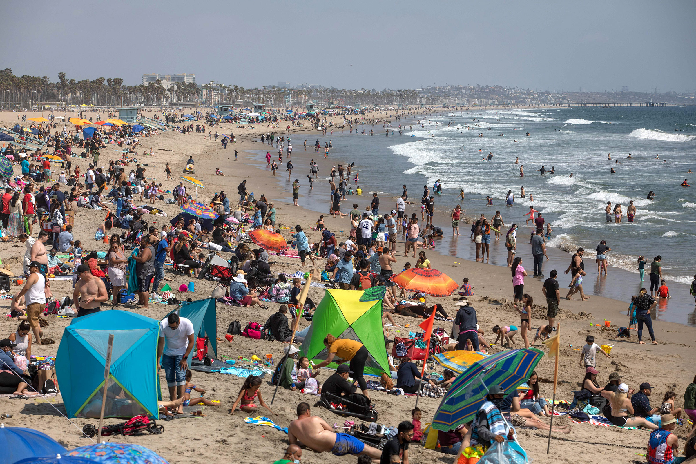 People gather at a beach in Santa Monica, California, on Saturday, May 29. 
