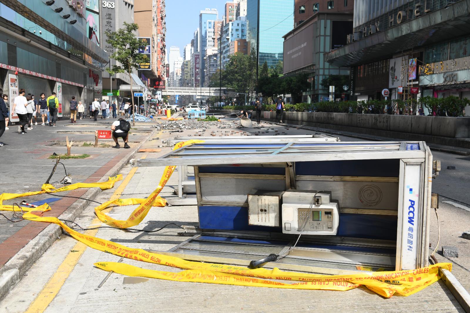 The roads are covered with bamboo barricades and bricks.