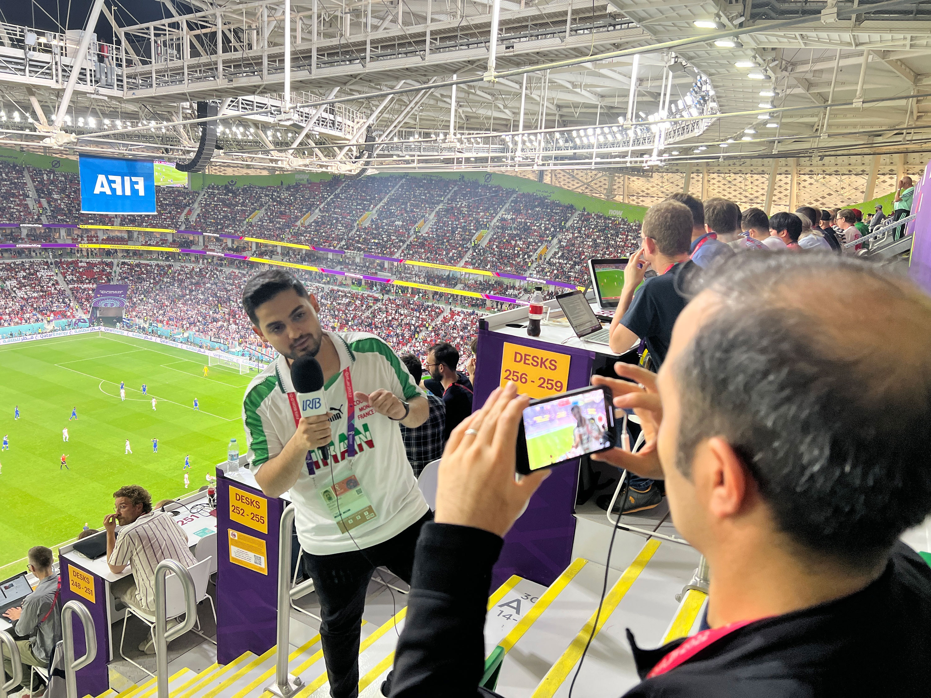 Iran state media (IRIB) reporting from inside the game and wearing the 1998 World Cup shirt. They’ll be hoping for a repeat of that night in France, when Iran knocked out the USA.