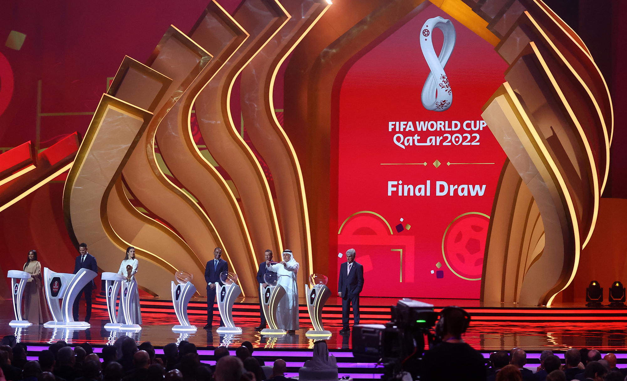 Adel Ahmed MalAllah draws South Korea during the FIFA World Cup draw on April 1 in Doha, Qatar. 