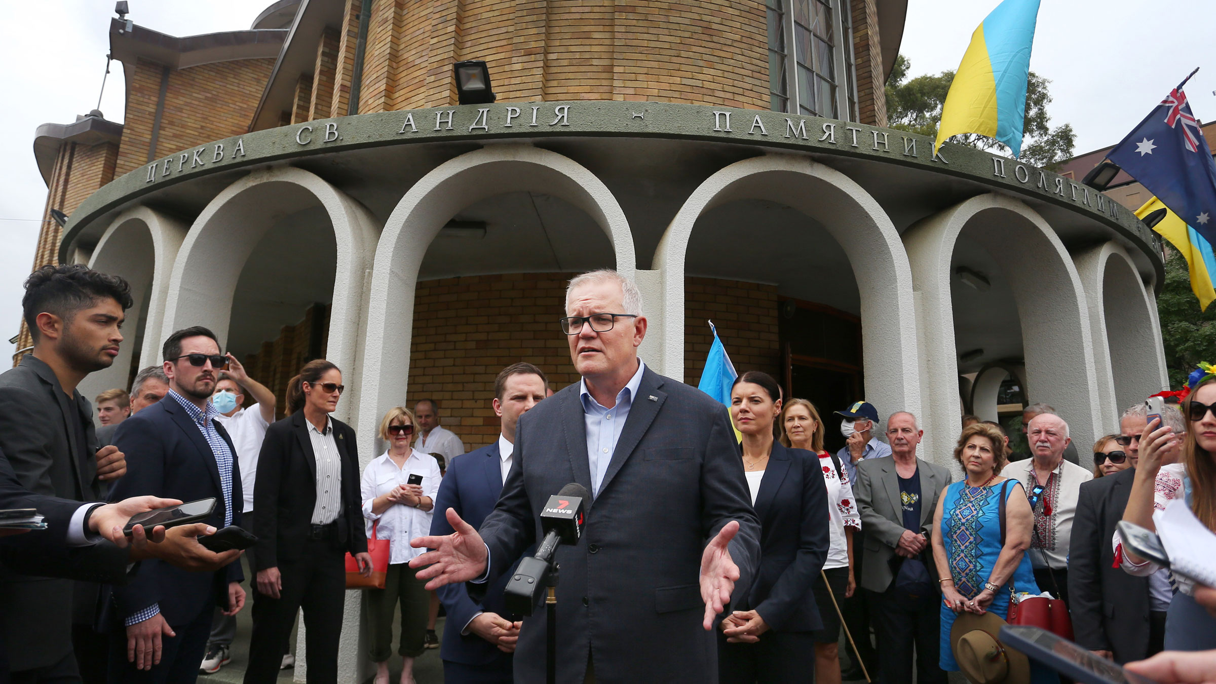 Australian Prime Minister Scott Morrison speaks with the media outside the St. Andrew's Ukrainian Catholic Church in Sydney on Sunday.