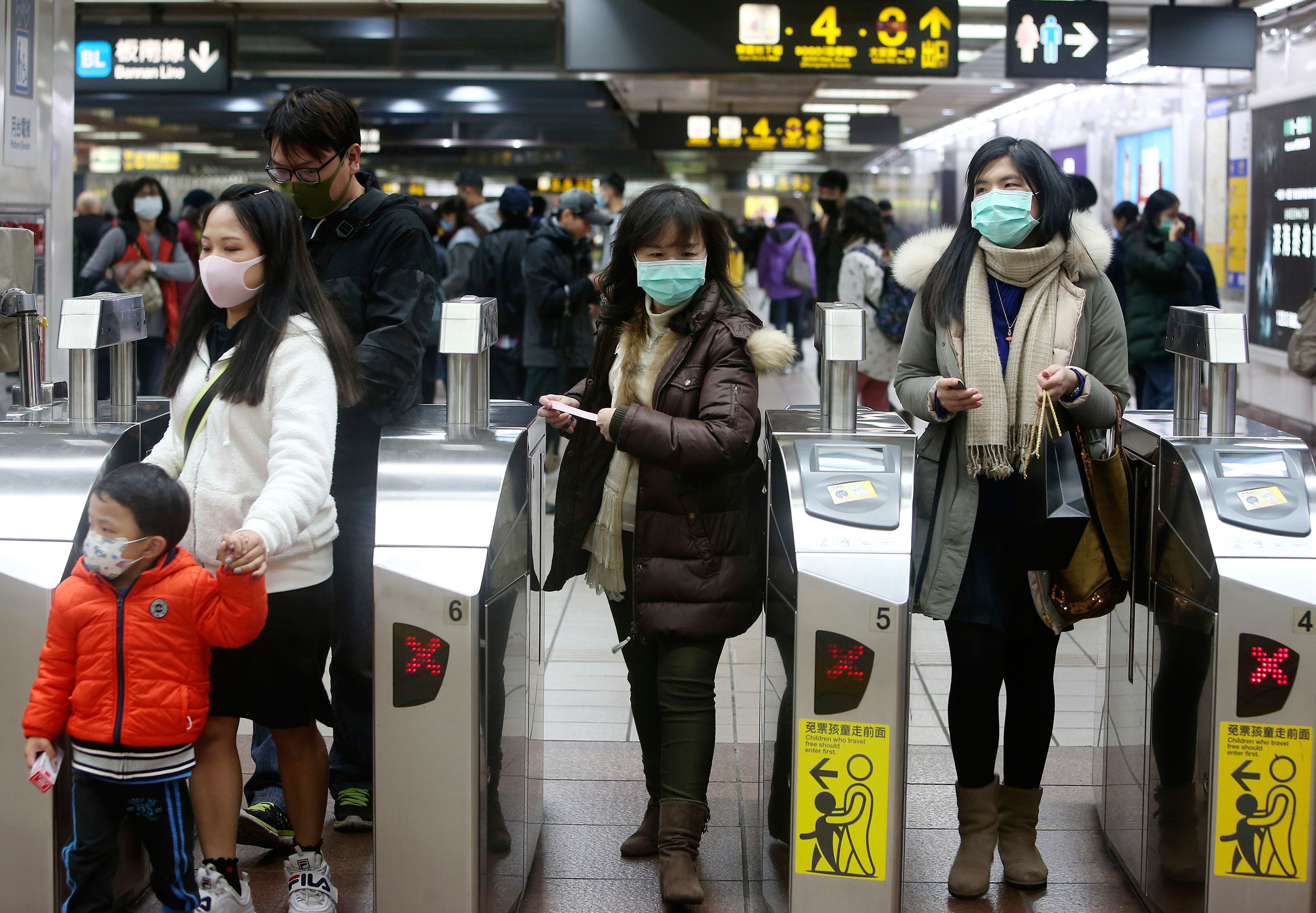 People wear masks at a metro station in Taipei, Taiwan, January 28.
