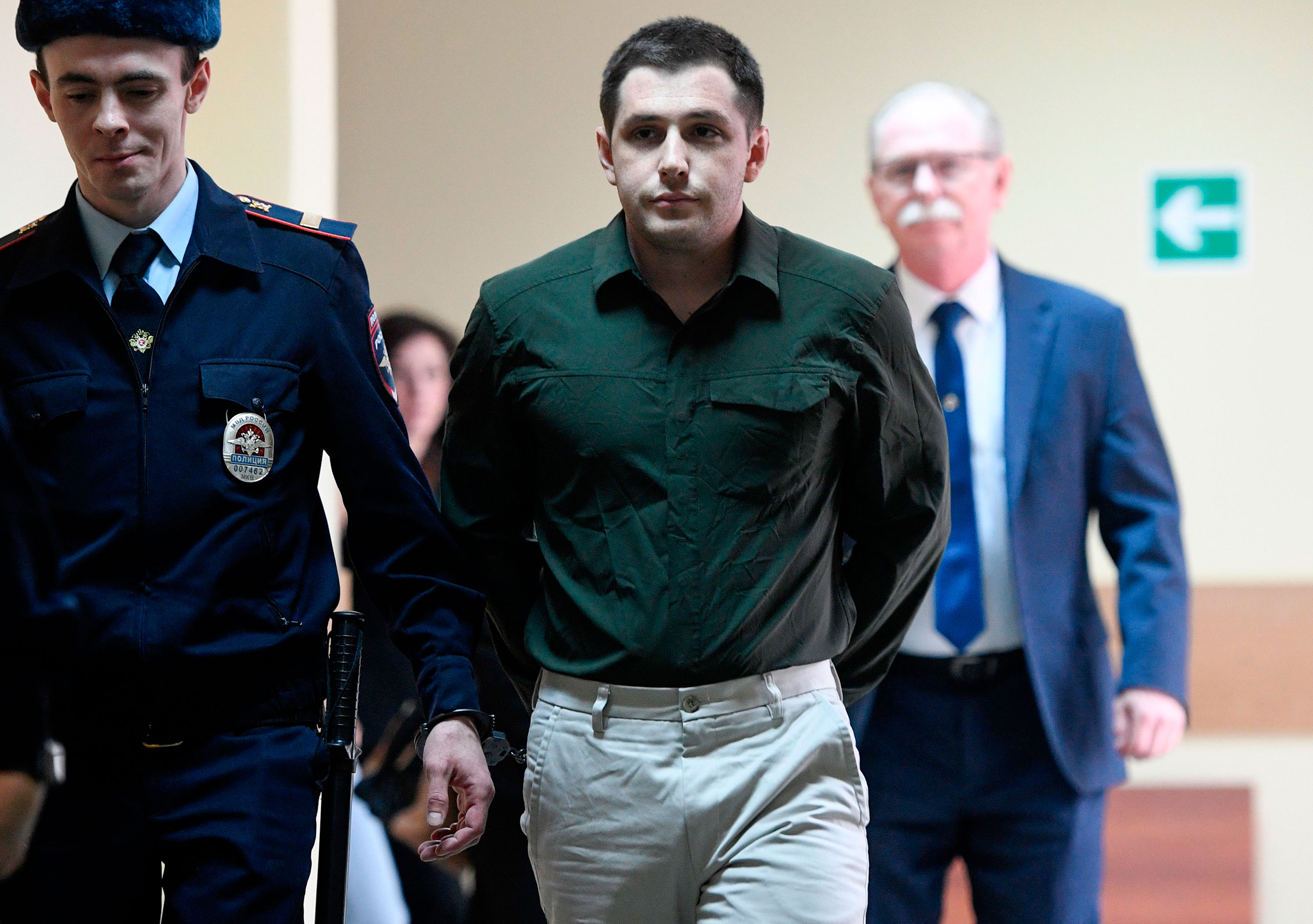 Trevor Reed is escorted to a hearing in Moscow in March 2020.