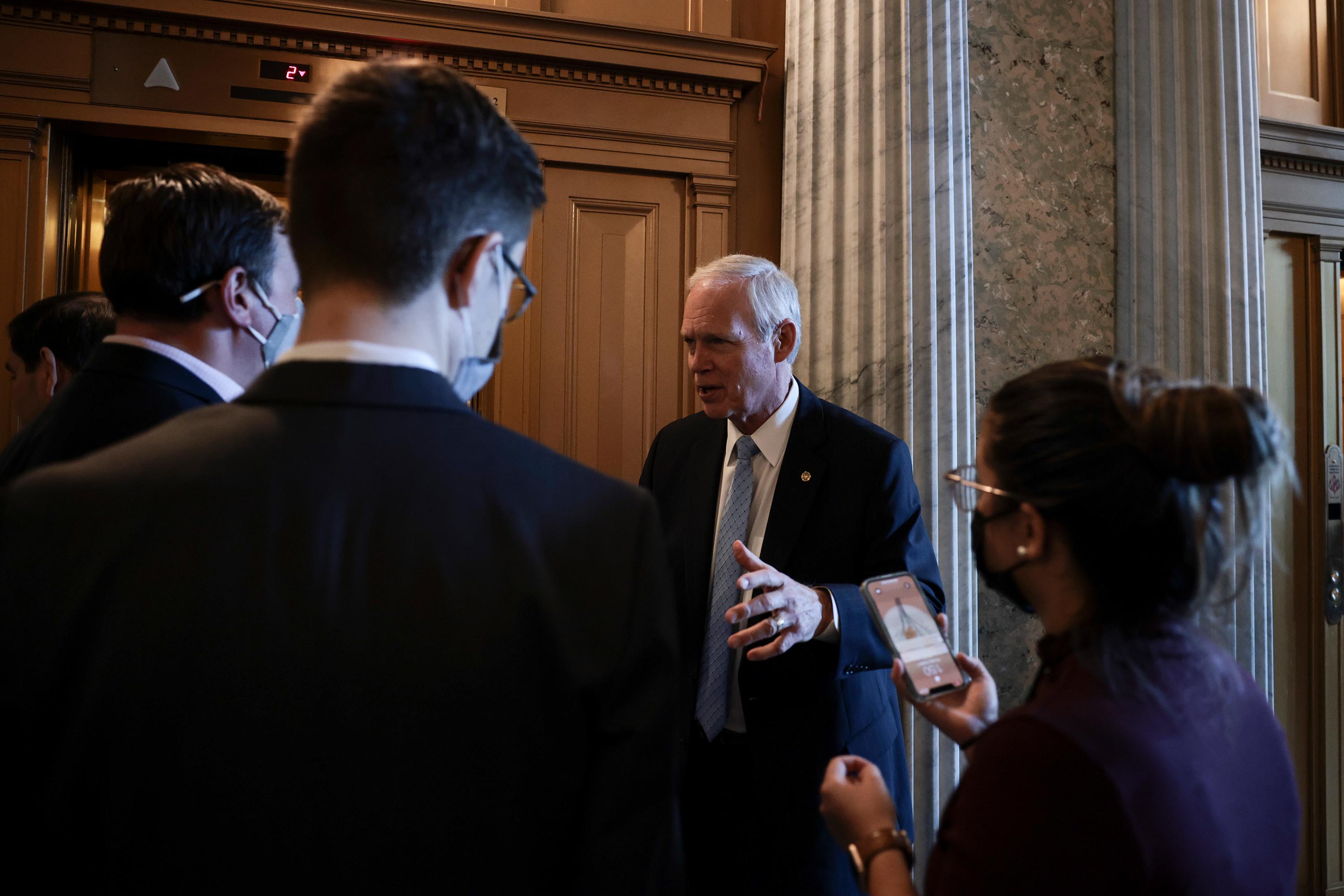 Sen. Ron Johnson speaks with reporters at the U.S. Capitol on Thursday, October 7.
