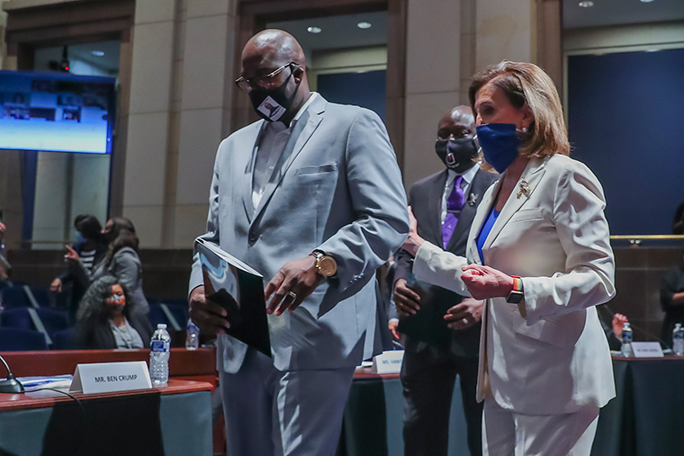Speaker of the House Nancy Pelosi  arrives with Philonise Floyd, brother of George Floyd, for a House Judiciary Committee hearing to discuss police brutality and racial profiling on Tuesday, June 10.