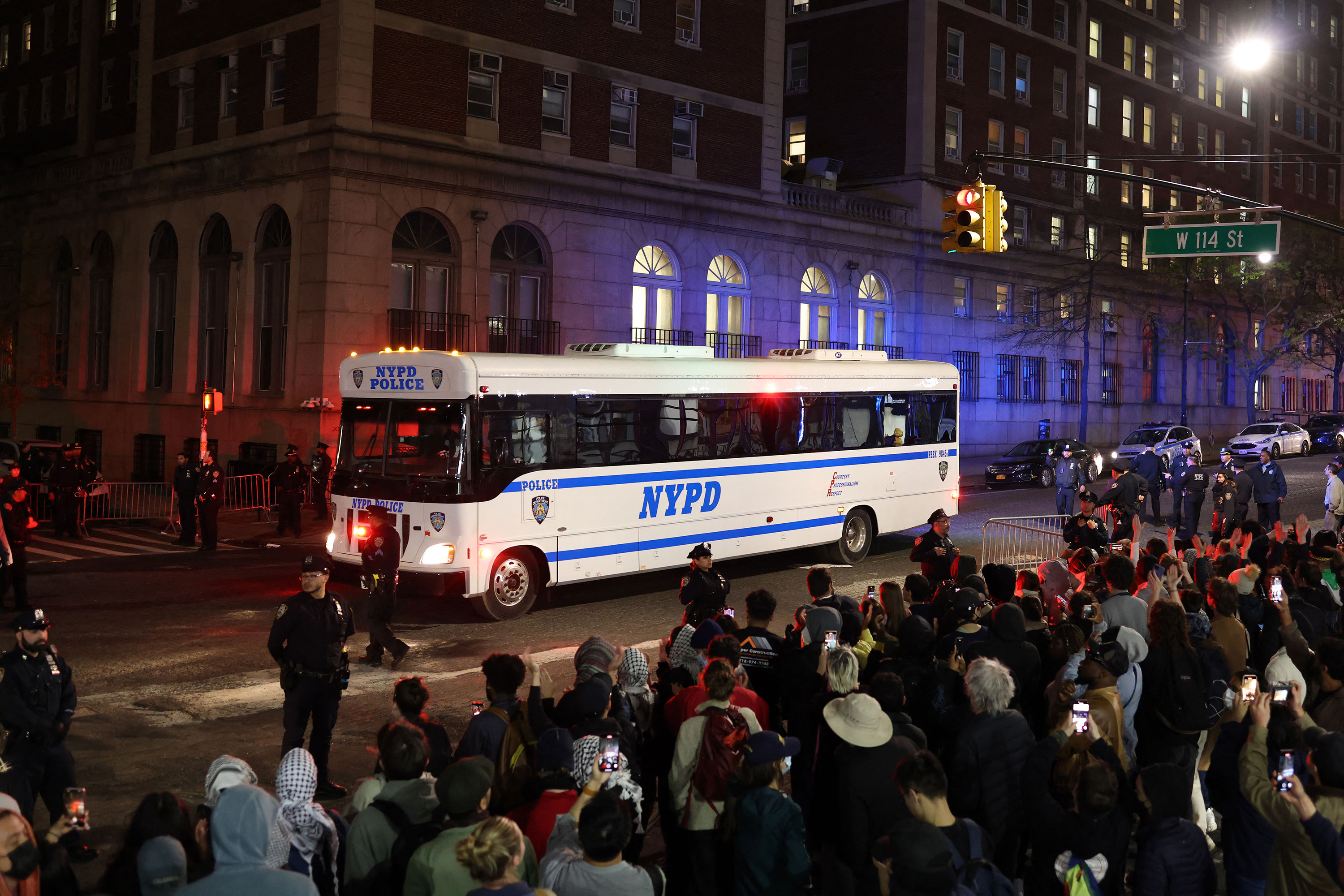A NYPD bus transports people detained at Columbia University. 