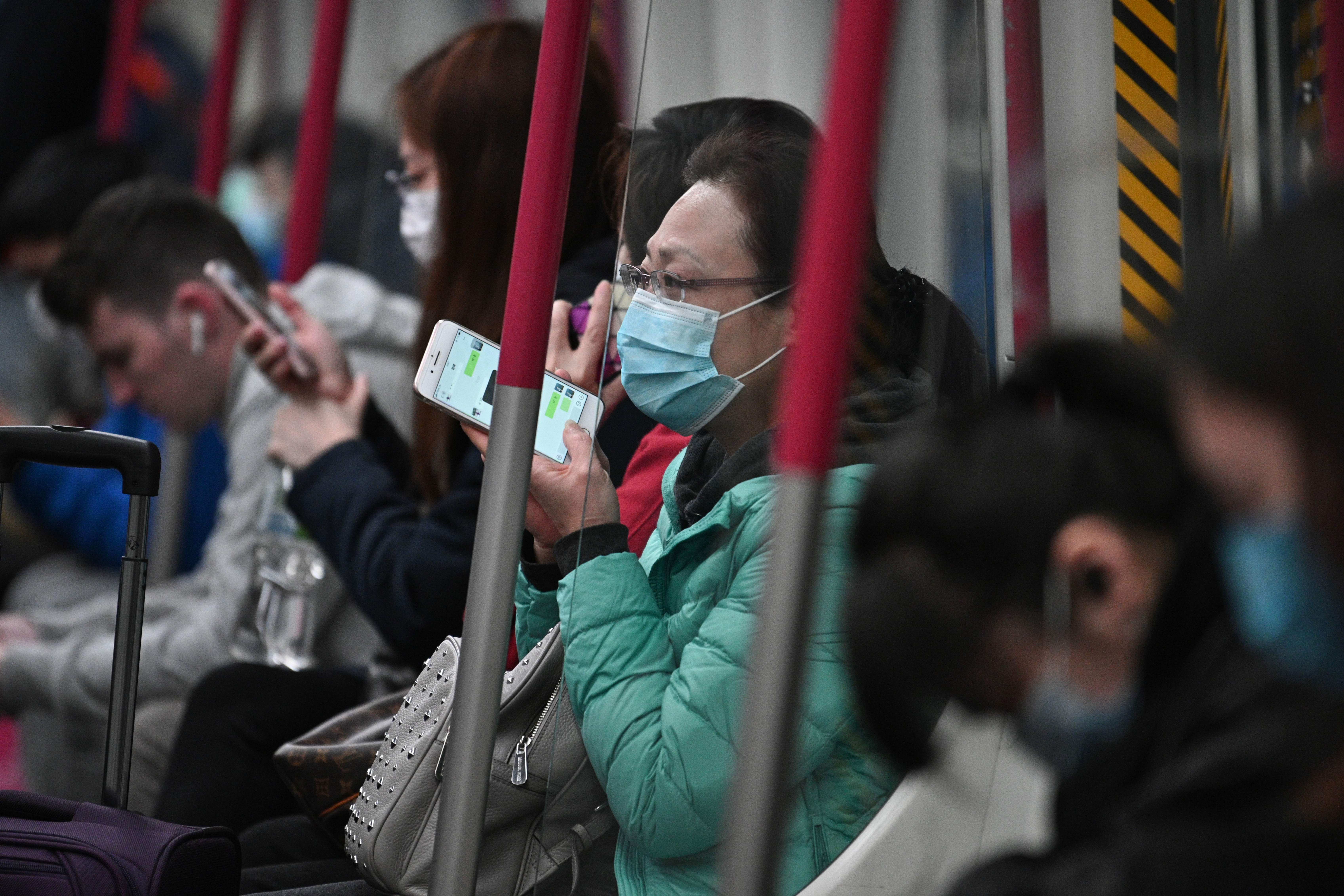 Commuters on the subway in Hong Kong on February 4, 2020.