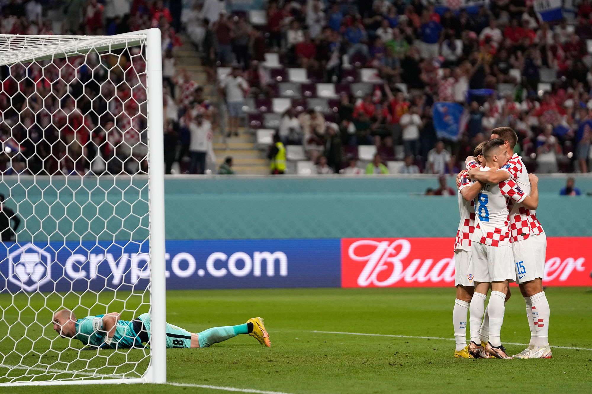 Croatia players celebrate their team’s fourth goal against Canada on Sunday. 
