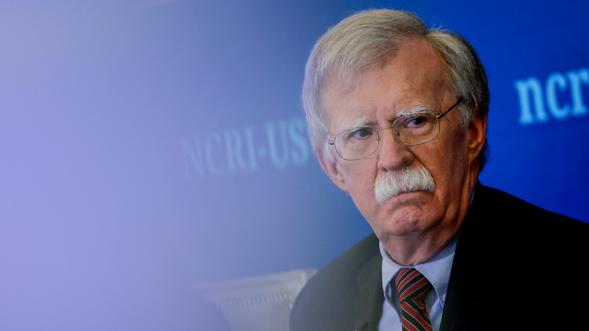 In this August 2022 photo, former National Security Adviser John Bolton speaks at a panel hosted by the National Council of Resistance of Iran – U.S. Representative Office (NCRI-US) at the Willard InterContinental Hotel in Washington, DC.
