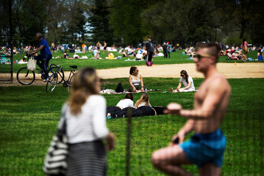 People rest and enjoy the day in Central Park maintaining social distancing norms, during the coronavirus outbreak in New York City on Saturday, May 2. 