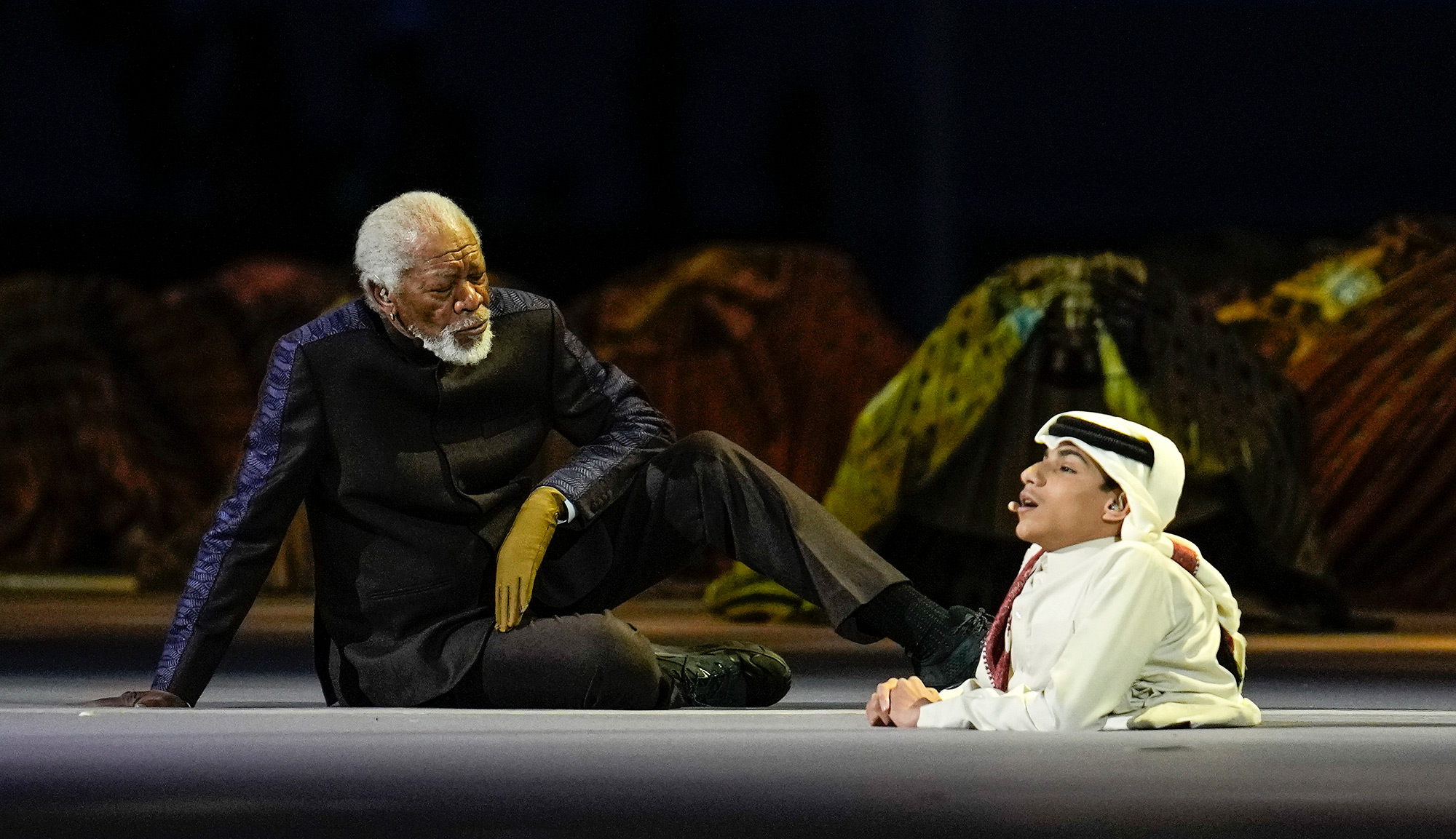 Actor Morgan Freeman appears with Qatari YouTuber Ghanim al Muftah.