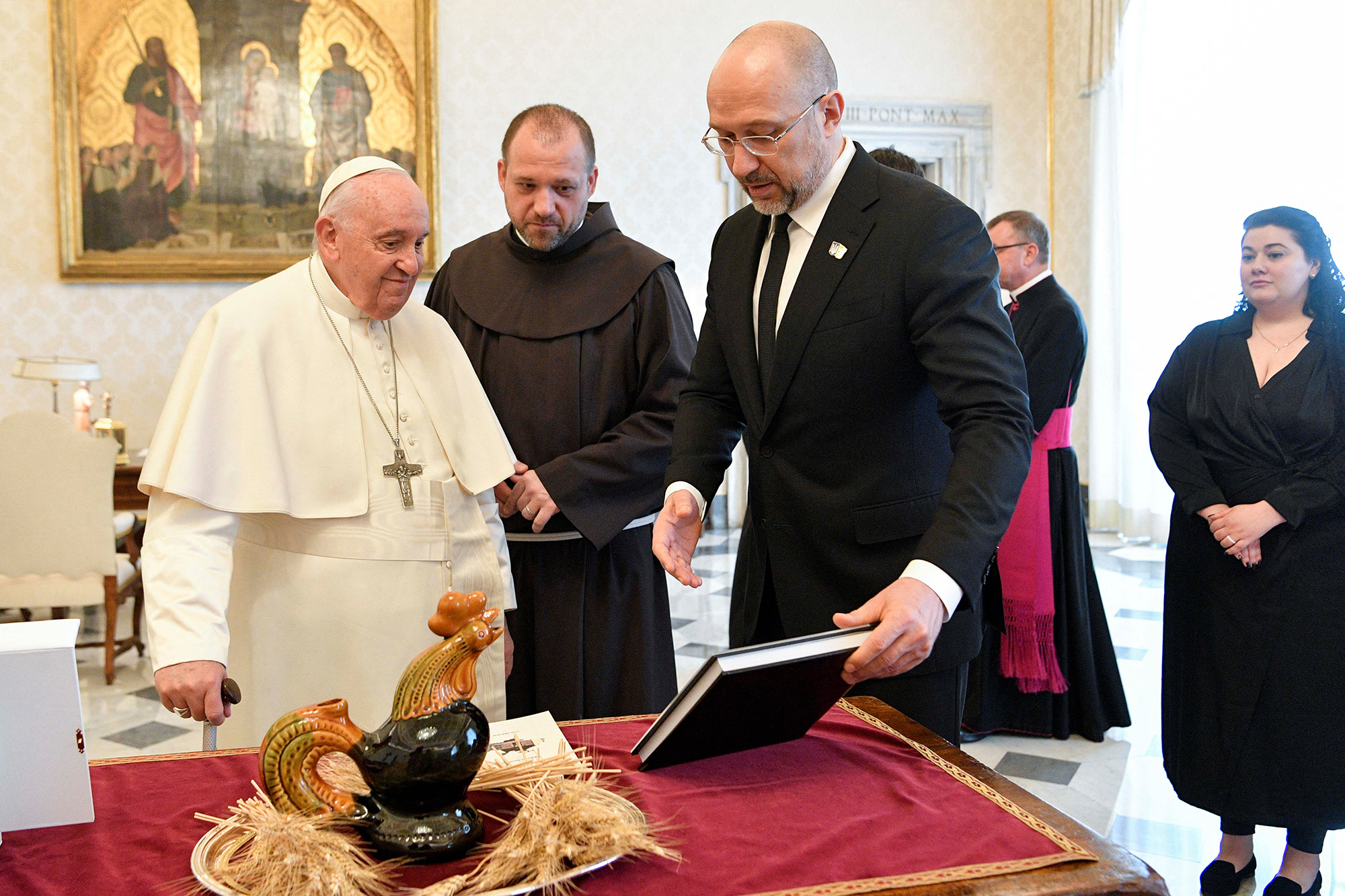 Pope Francis, left, meets with Ukrainian Prime Minister Denys Shmyhal during their meeting at the Vatican on April 27.
