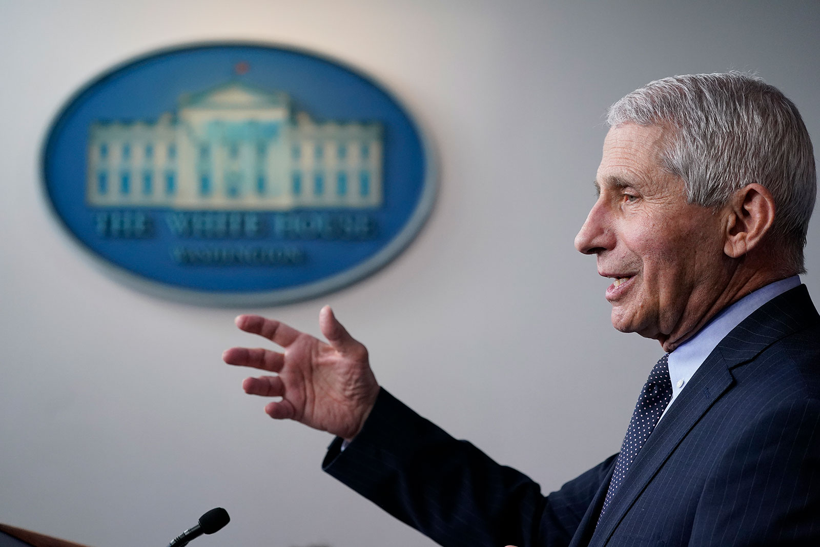 Dr. Anthony Fauci speaks with reporters at the White House on January 21.