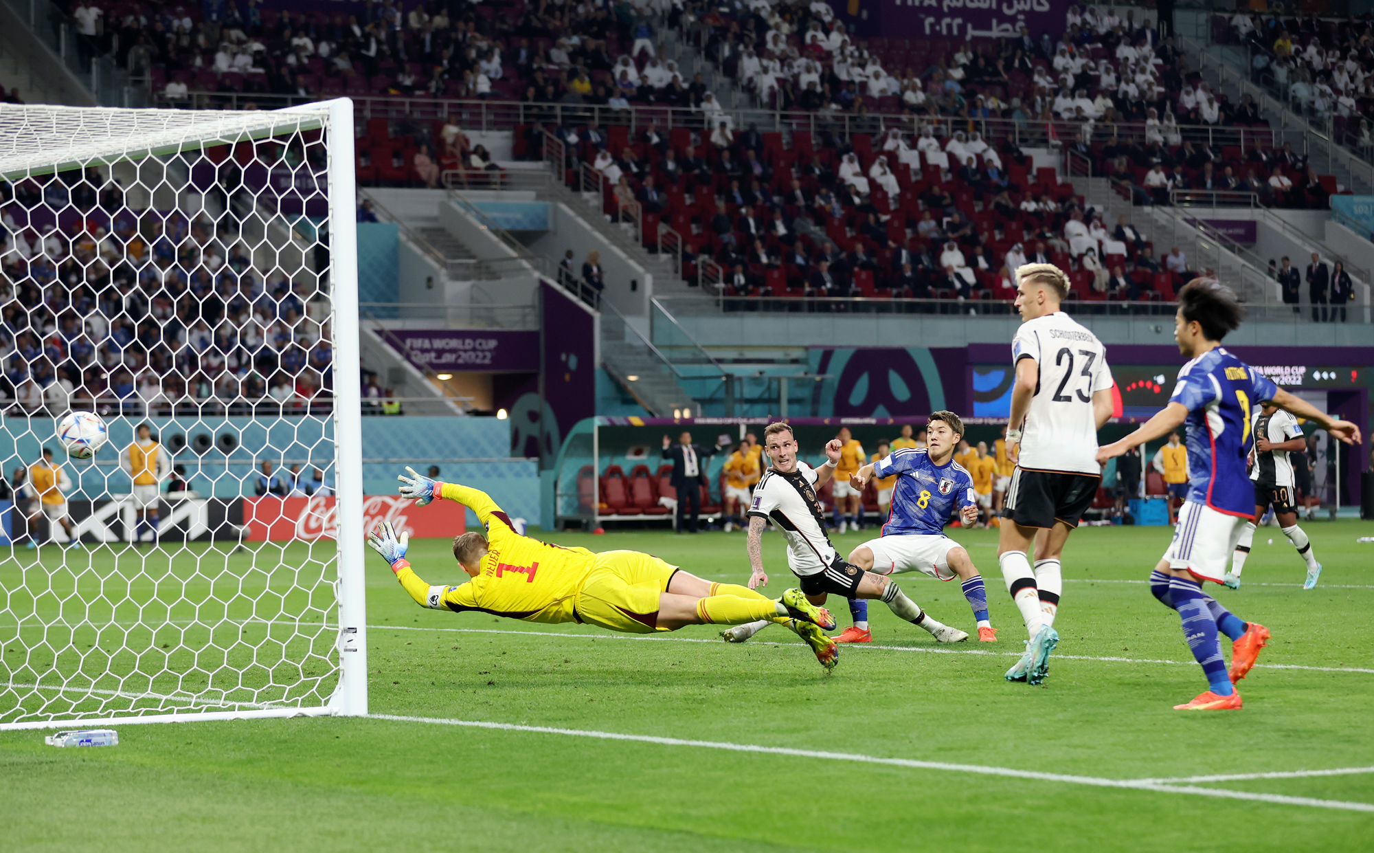 Ritsu Dōan of Japan scores their team's first goal against Germany at Khalifa International Stadium in Doha, Qatar on Wednesday.