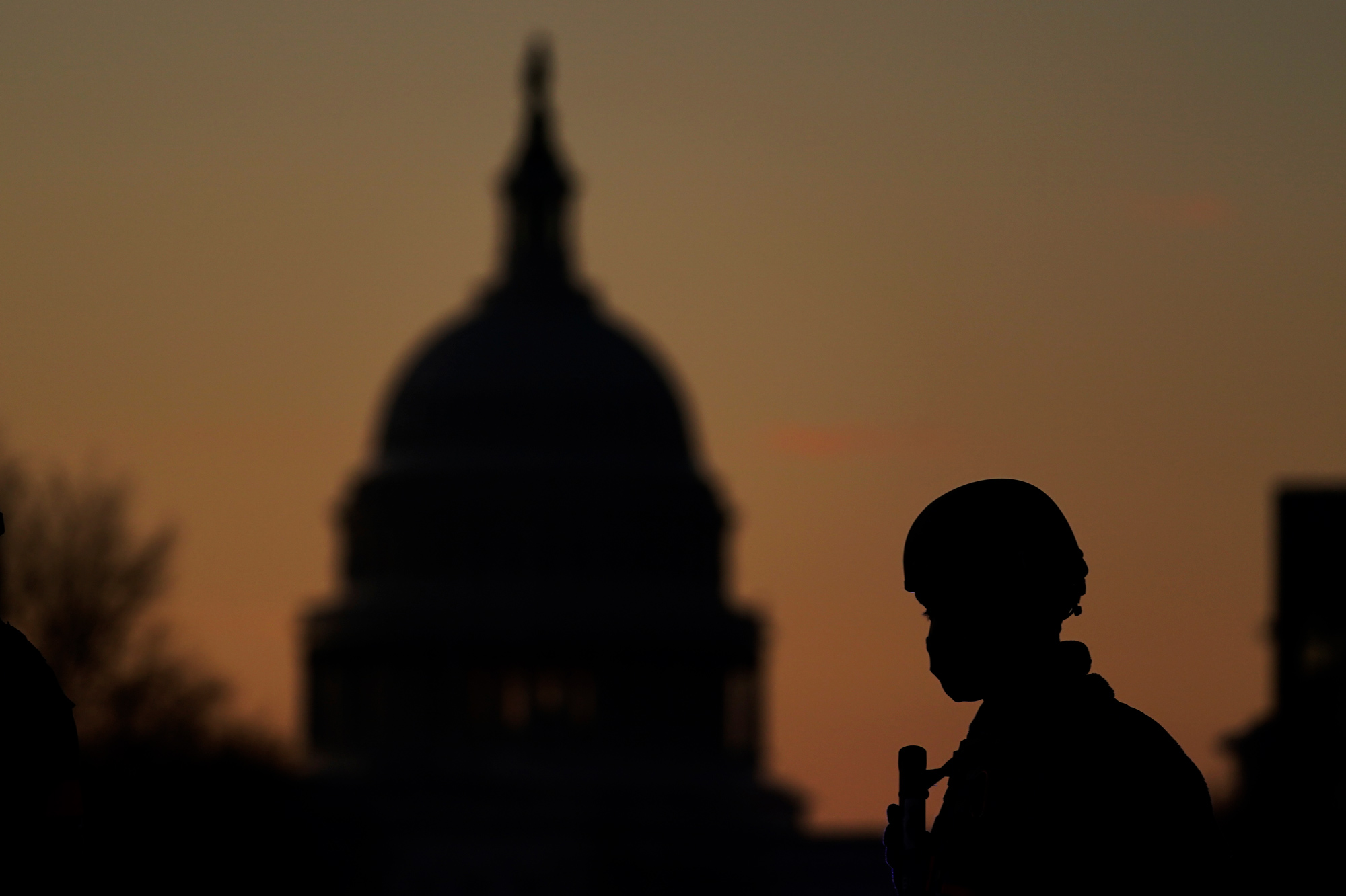 A National Guard patrols a road block near the Capitol on January 19 in Washington, DC. 
