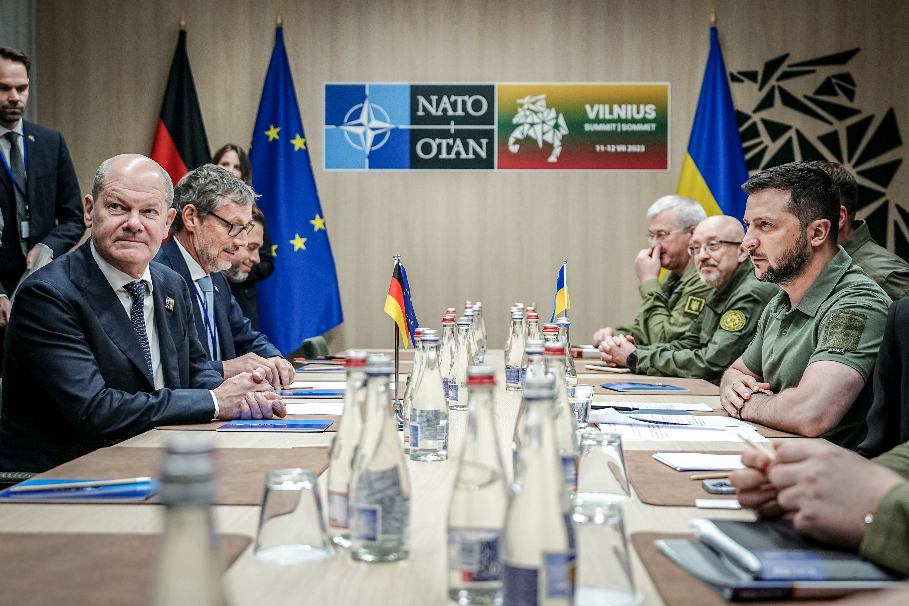 German Chancellor Olaf Scholz and Ukrainian President Volodymyr Zelensky meet at the NATO summit on July 12, in Vilnius, Lithuania.