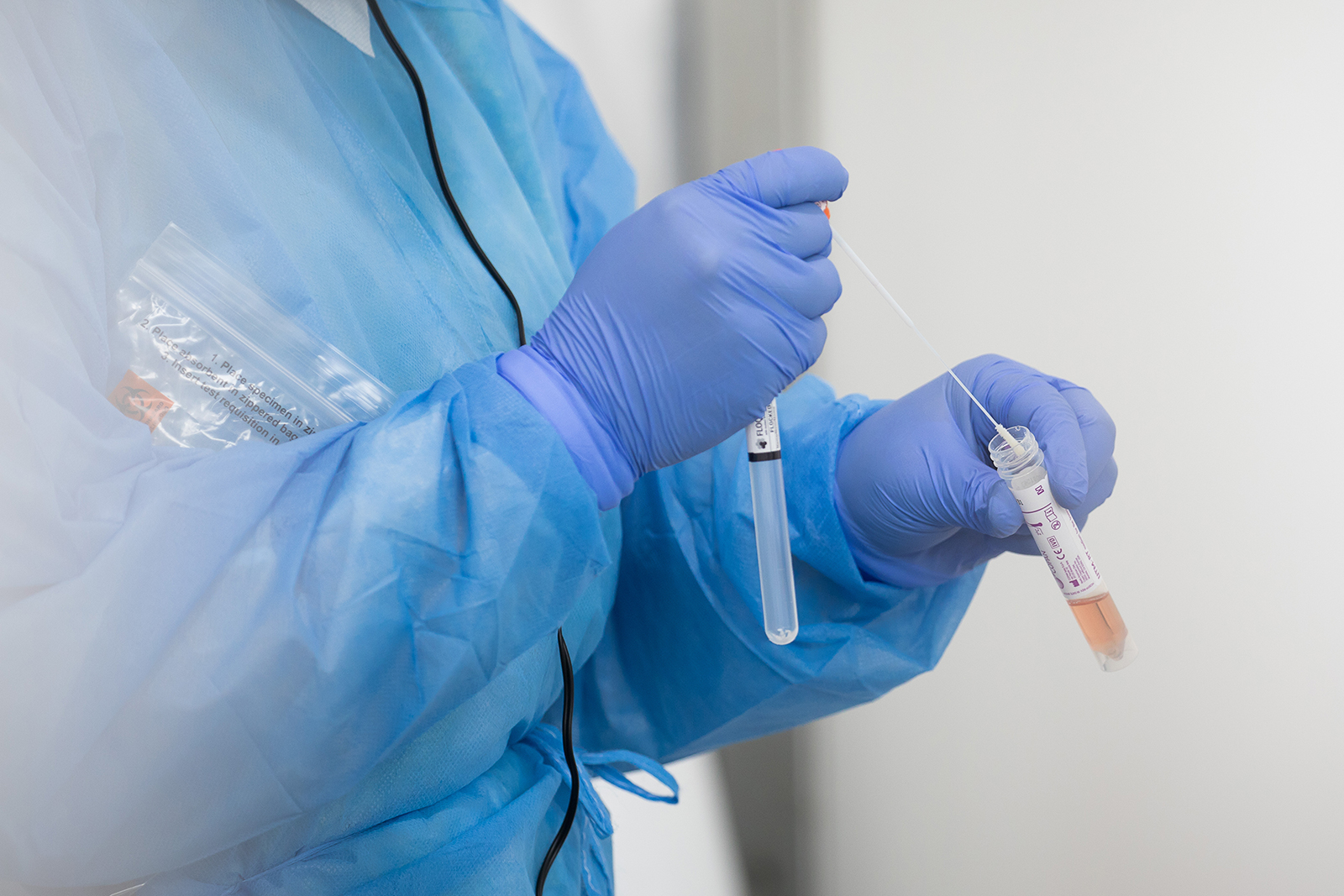 A One Medical Group Inc. nurse practitioner places a swab inside a test tube after swabbing a patient at a Covid-19 testing center in Brooklyn, New York on April 20. Michael Nagle/Bloomberg/Getty Images
