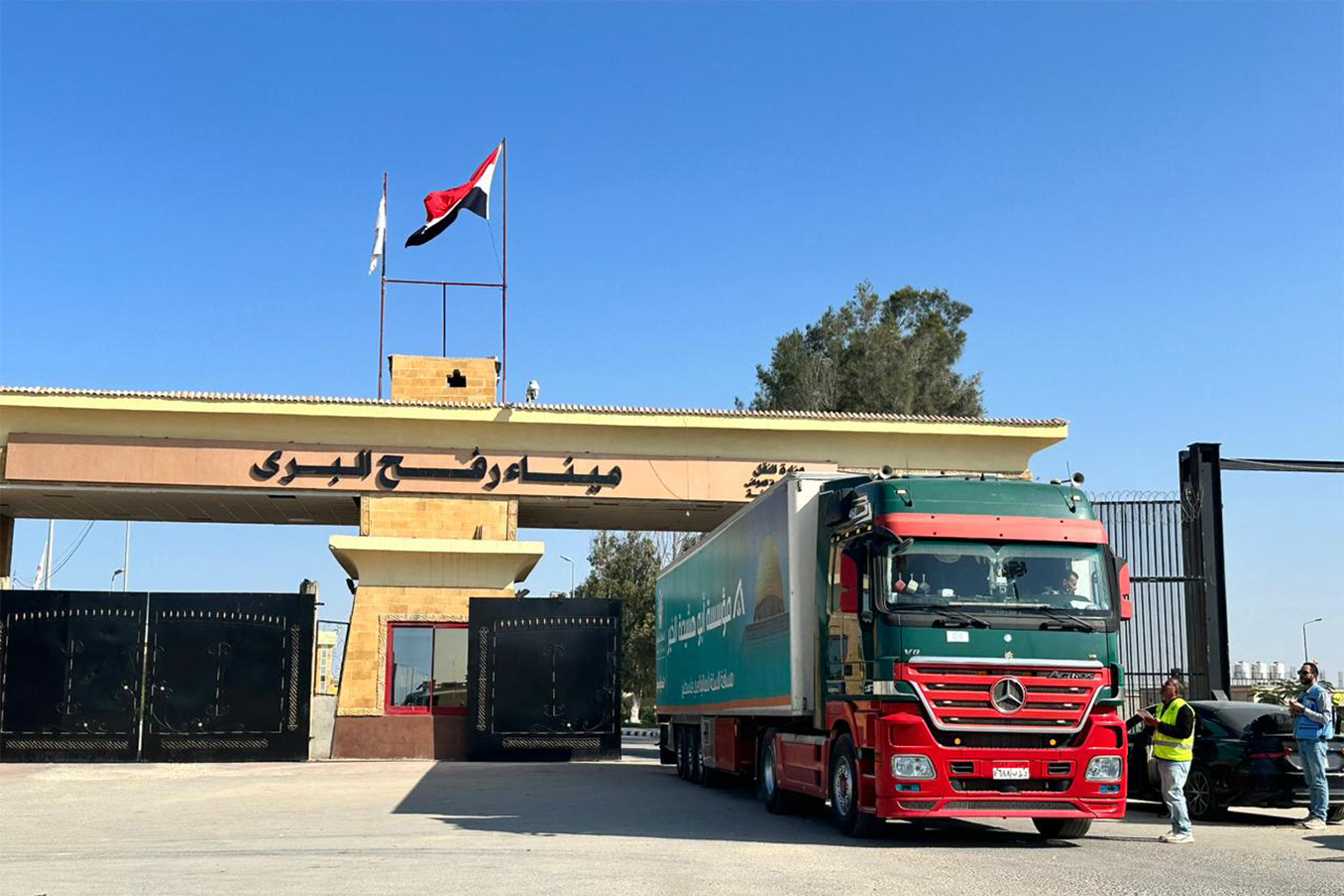 An aid truck returns after unloading humanitarian aid at Egypt's Rafah border crossing with Gaza on December 4, 2023.