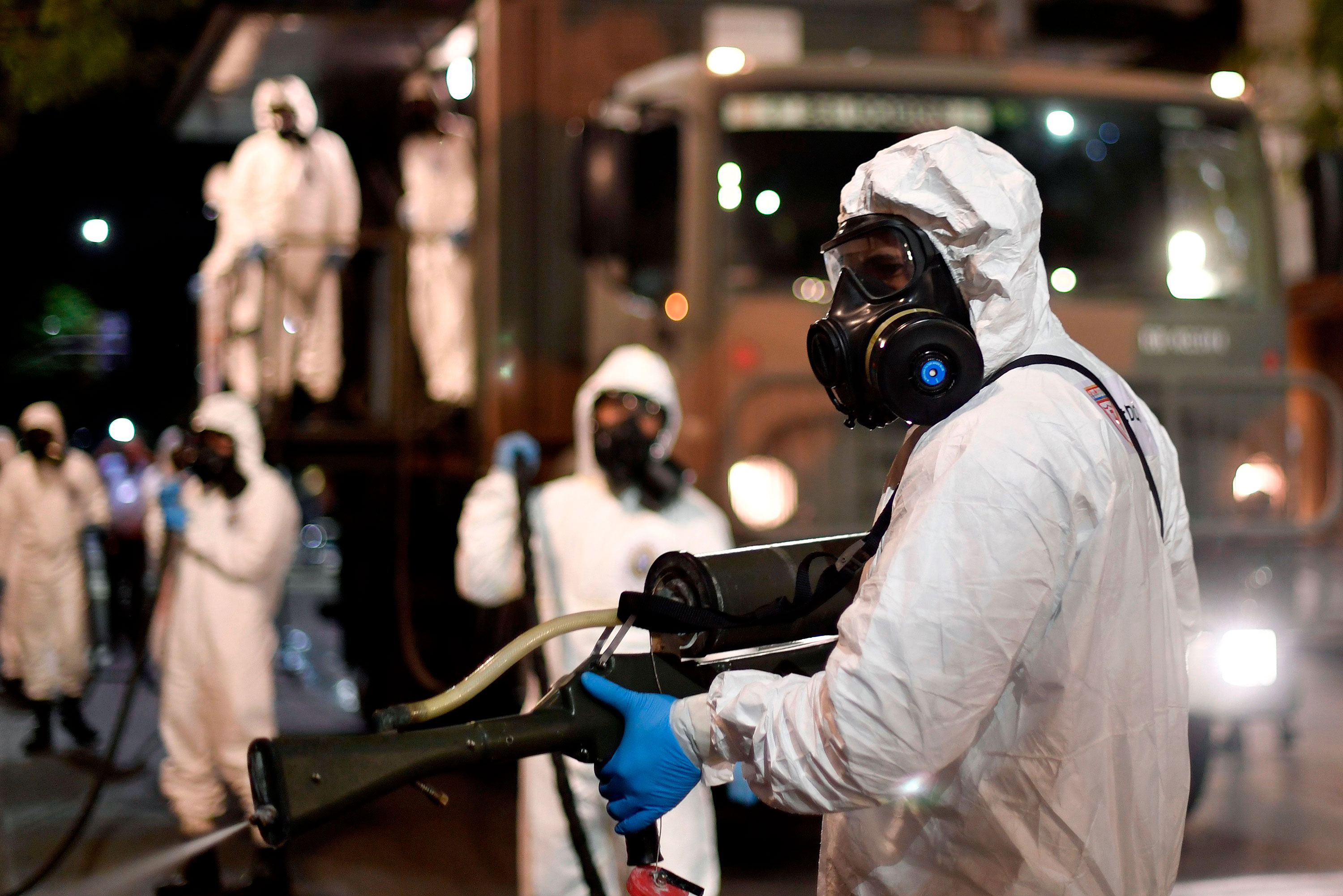 Soldiers spray disinfectant at a market in Belo Horizonte, Brazil, on August 18.