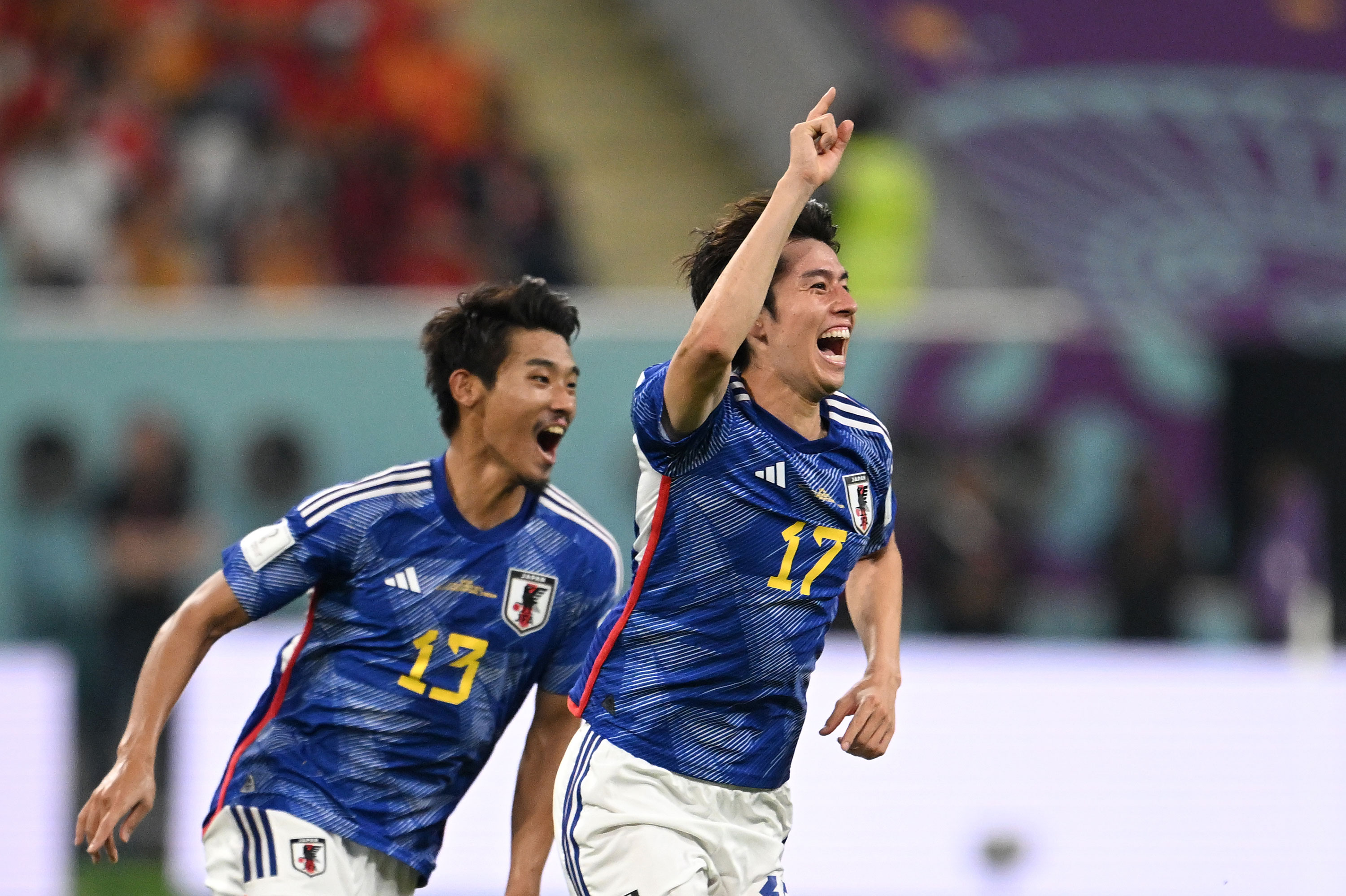 Japan's Ao Tanaka celebrates after scoring his team's second goal.