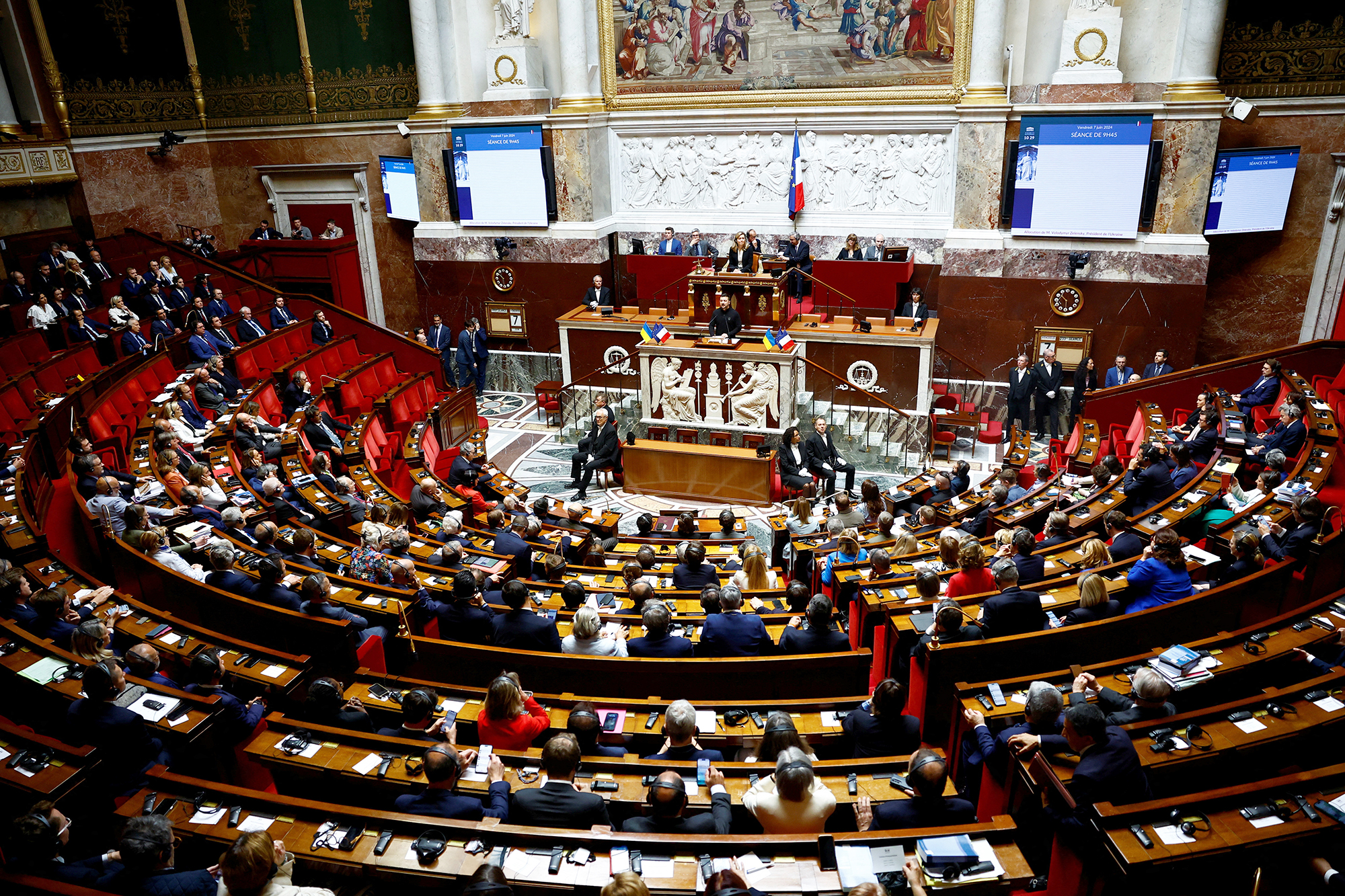 Ukrainian President Volodymyr Zelensky addresses lawmakers at France's National Assembly in Paris, France, on June 7.