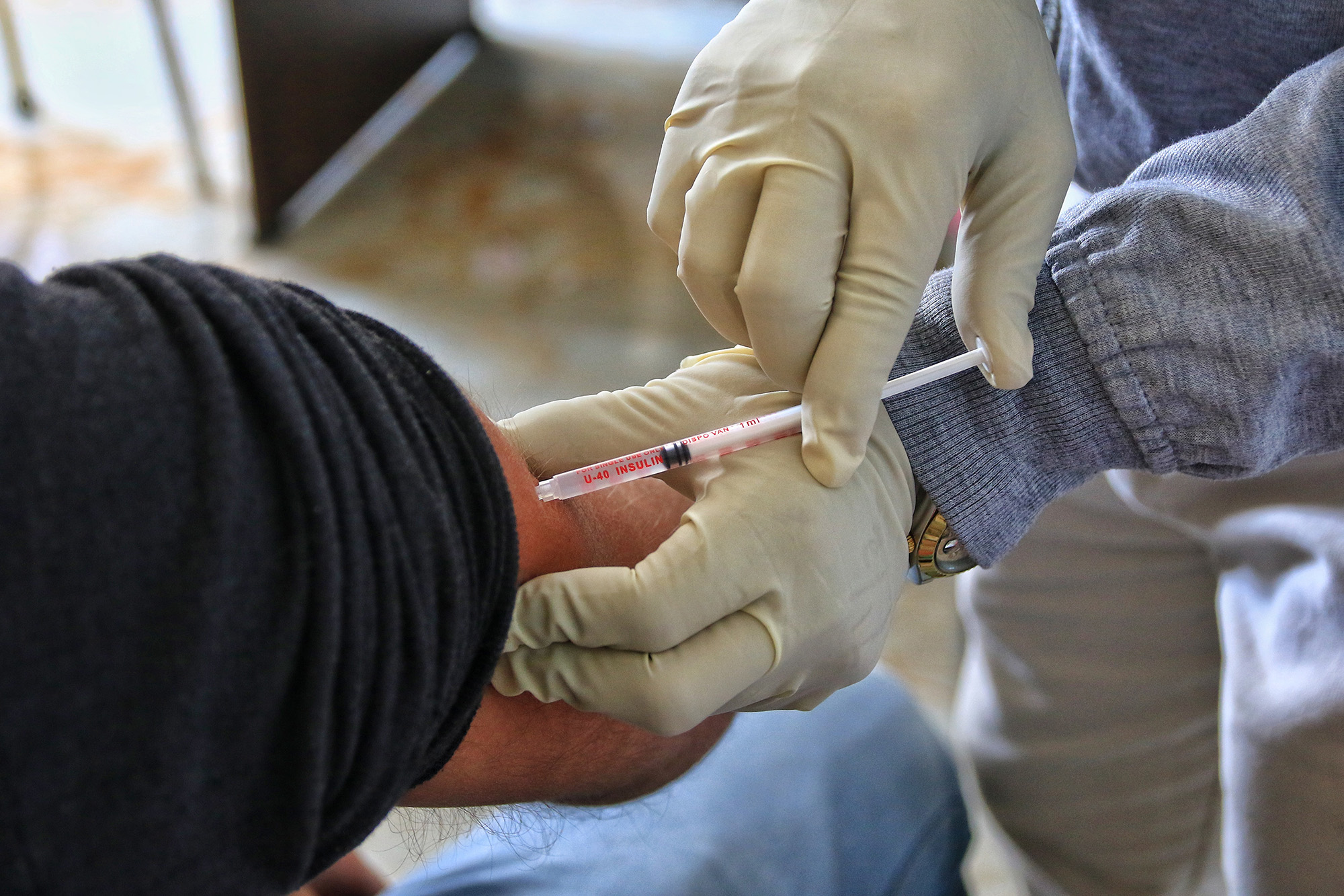 A volunteer is vaccinated with Bharat Biotech's Covaxin during a human trial at the Maharaja Agrasen Super Speciality Hospital in Jaipur, Rajasthan, India, on December 18, 2020. 
