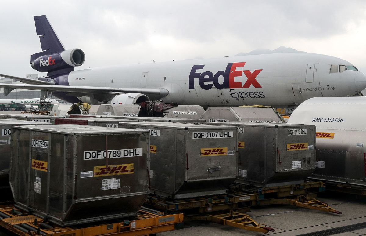 A FedEx airliner is seen at Hong Kong International Airport on February 26, 2019.