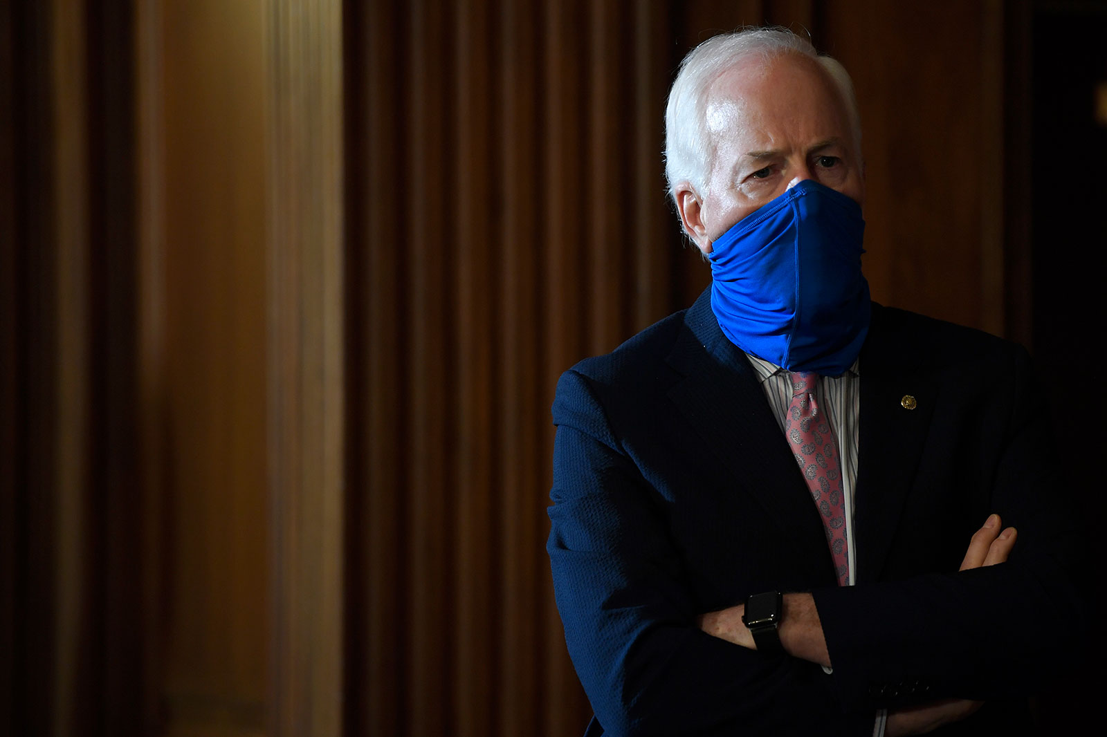 Sen. John Cornyn listens during a news conference in Washington, DC, on Monday, July 27.