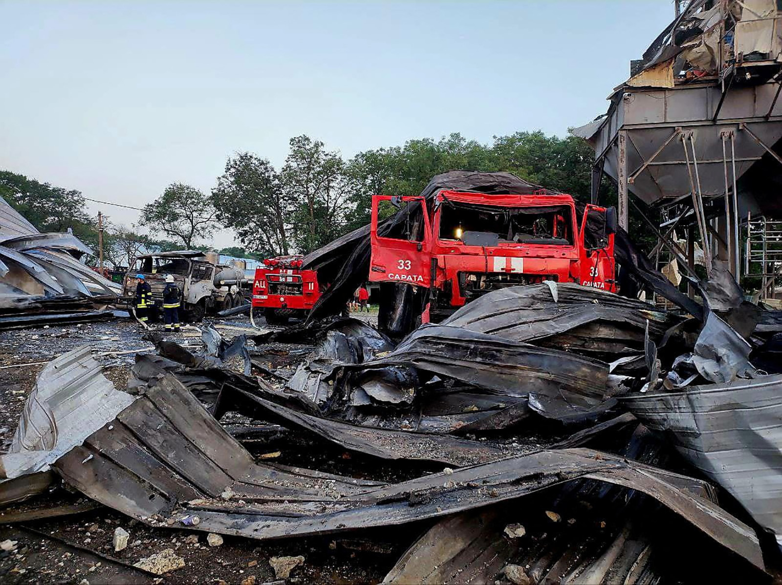 A heavily damaged emergency vehicle is seen at a compound of an agricultural company hit by a Russian missile strike in Odesa region, Ukraine, on July 21.