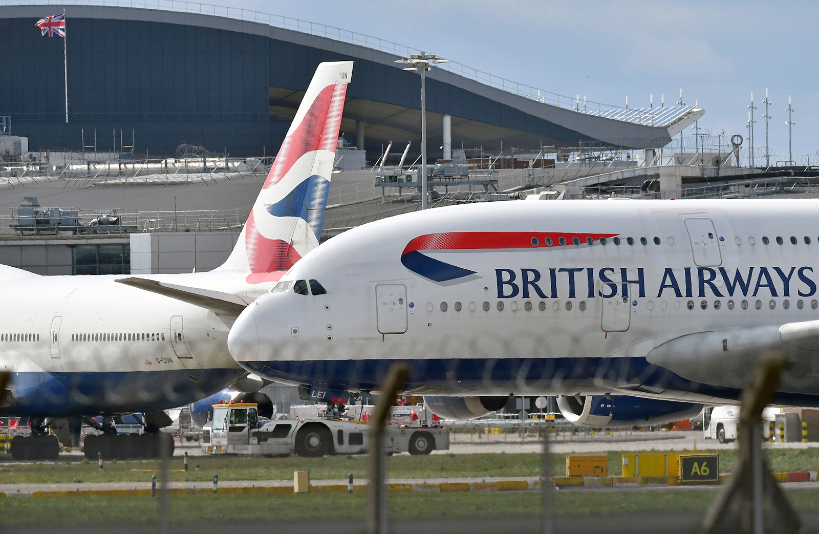 A British Airways Airbus A380 passenger jet is moved by an aircraft tractor at London's Heathrow Airport, on April 2.