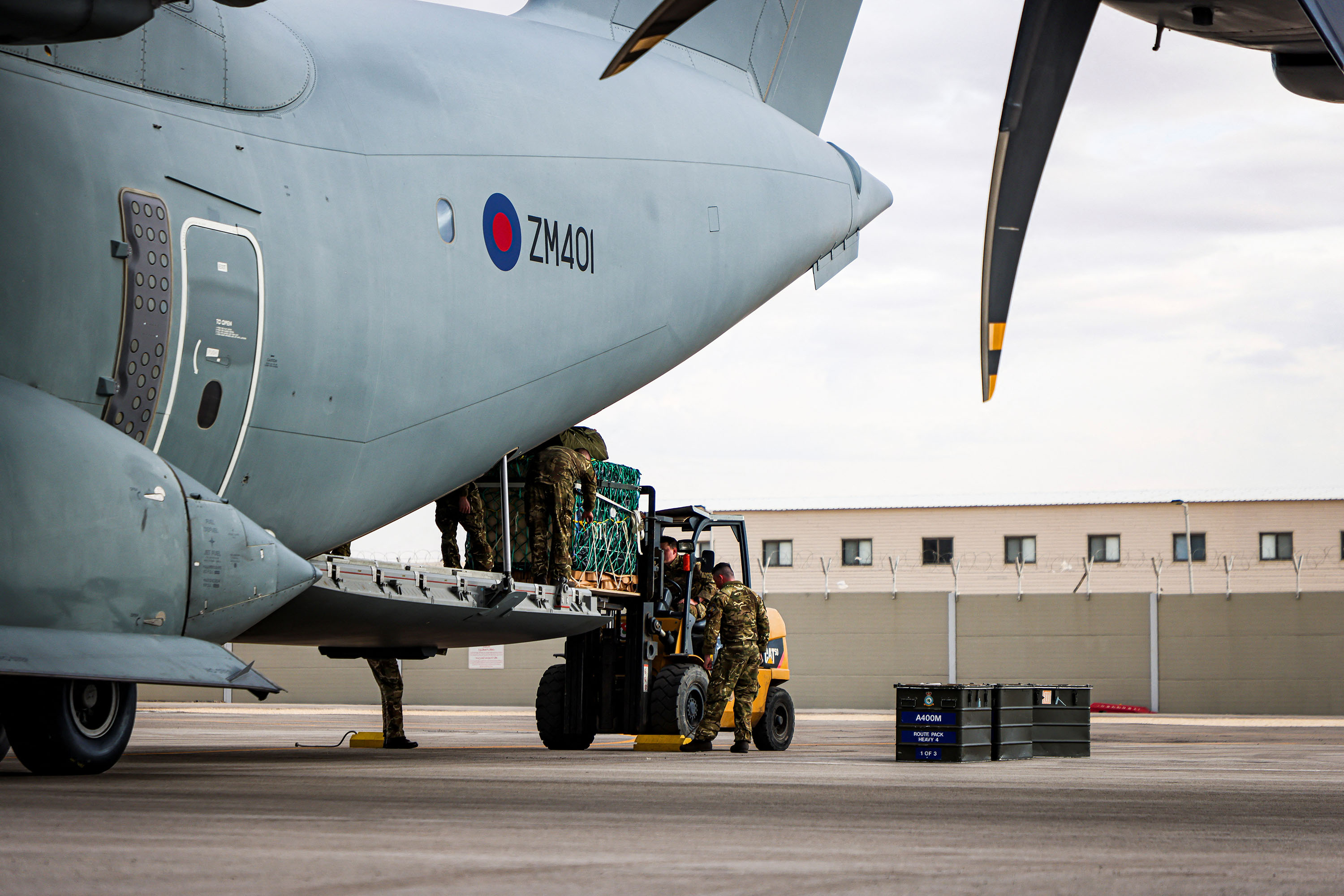 Humanitarian aid is loaded onto a Royal Air Force aircraft in Amman, Jordan, in this handout released on March 26.