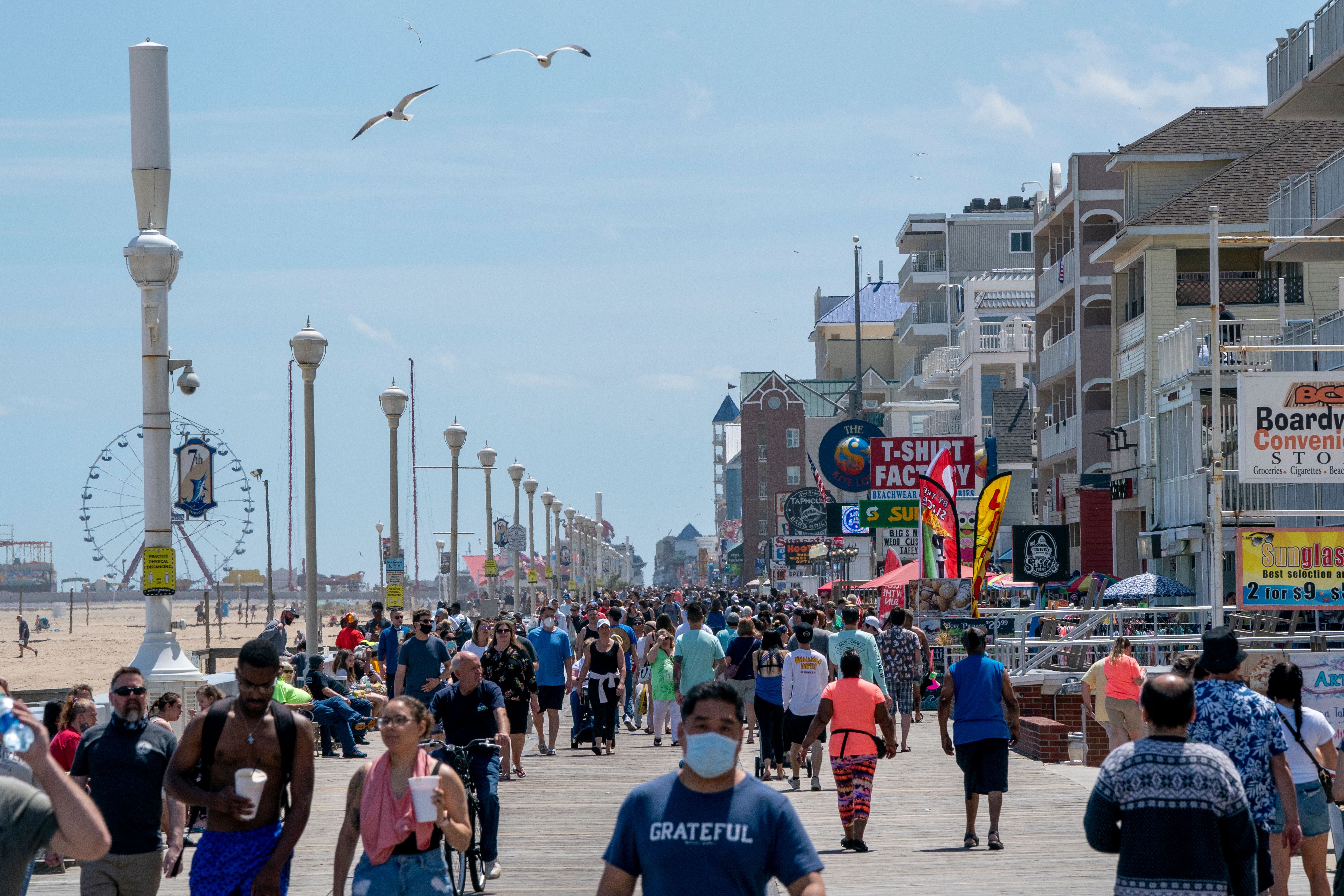 People visit the boardwalk in Ocean City, Maryland, on May 23.