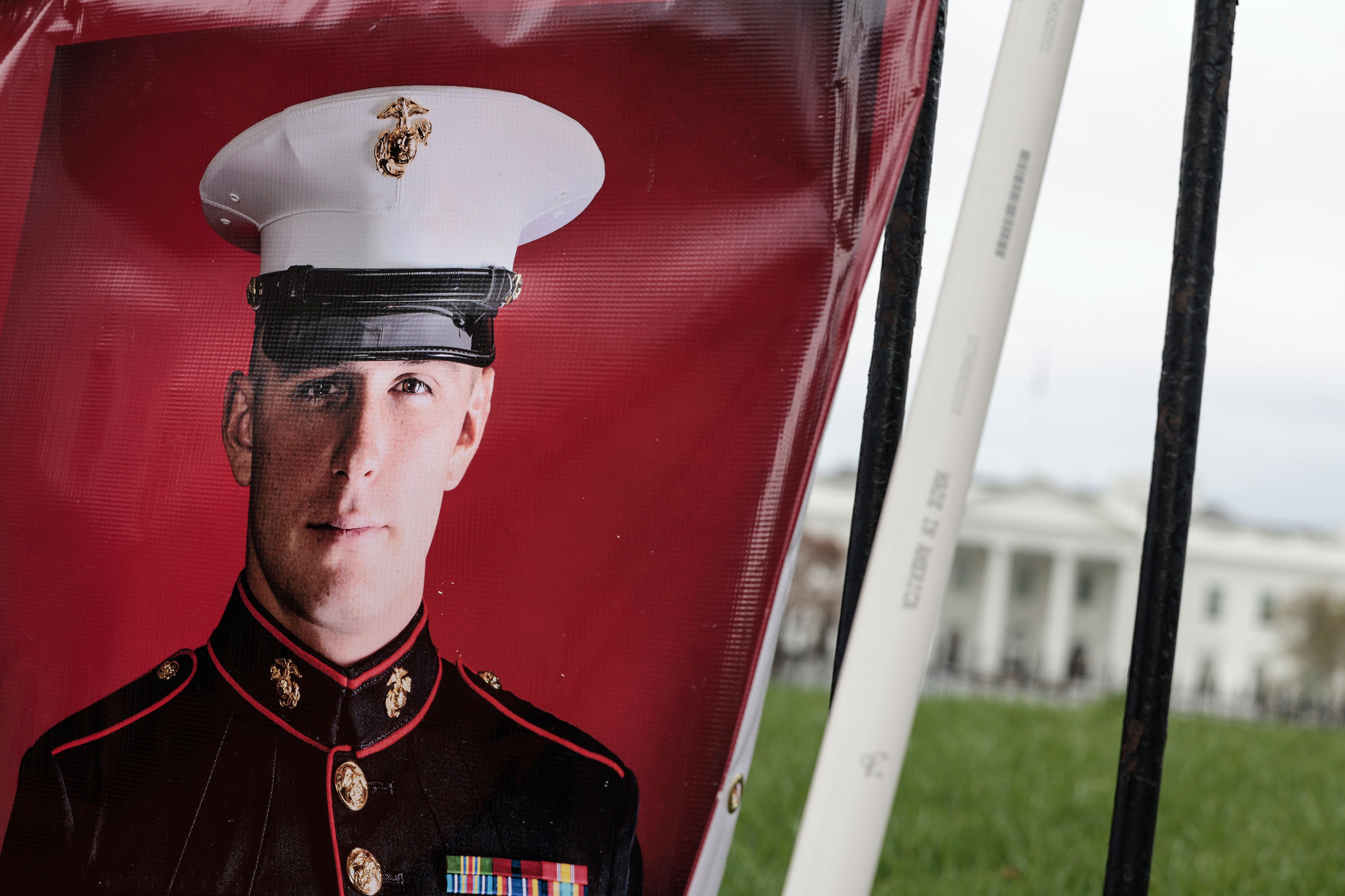A banner with a picture of Trevor Reed hangs in Lafayette Park near the White House in March 2022.