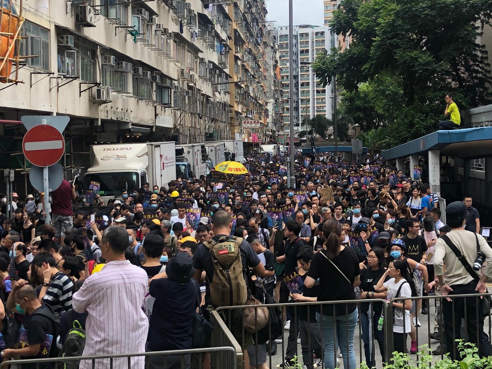 Protesters push barricades and build Lennon Walls along Mong Kok route