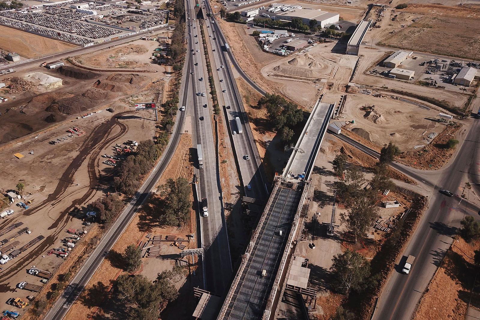 A high-speed rail line is constructed over a highway in Fresno, California, on August 26.