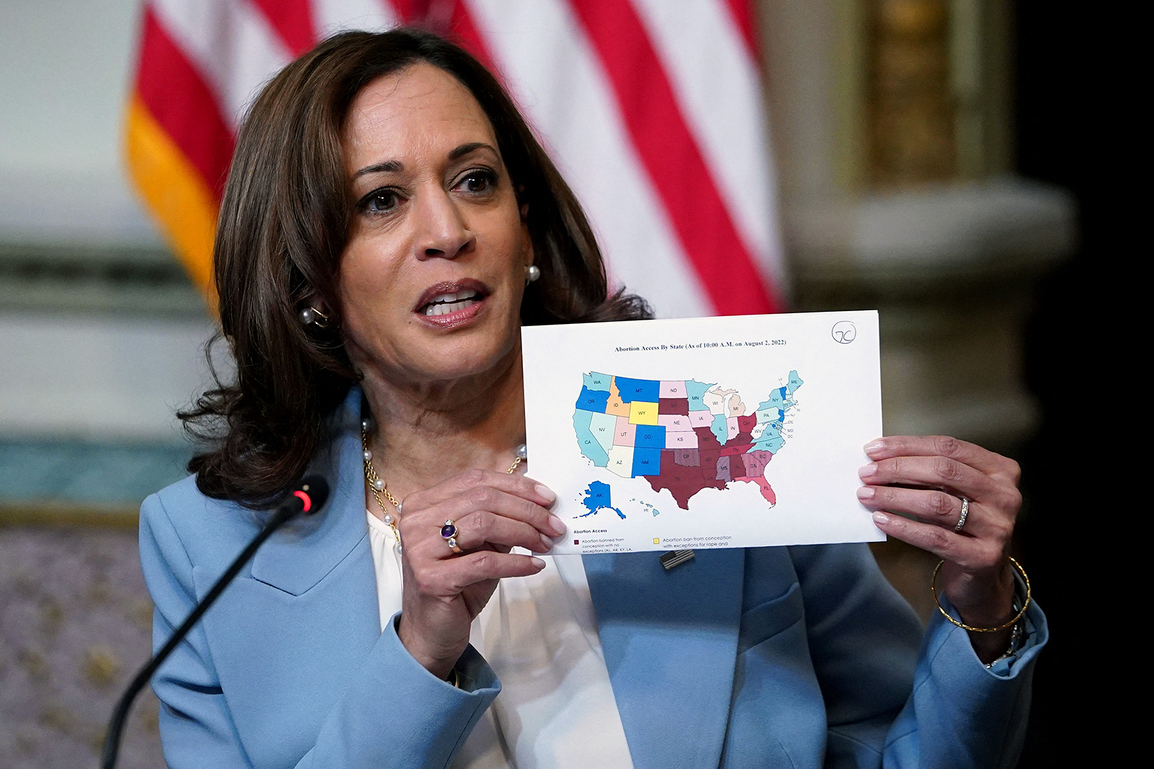 Vice President Kamala Harris holds up a map displaying abortion access in the United States, while delivering remarks during the first meeting of the interagency Task Force on Reproductive Healthcare Access in the Indian Treaty Room of the Eisenhower Executive Office Building, next to the White House, in Washington, DC, on August 3, 2022.