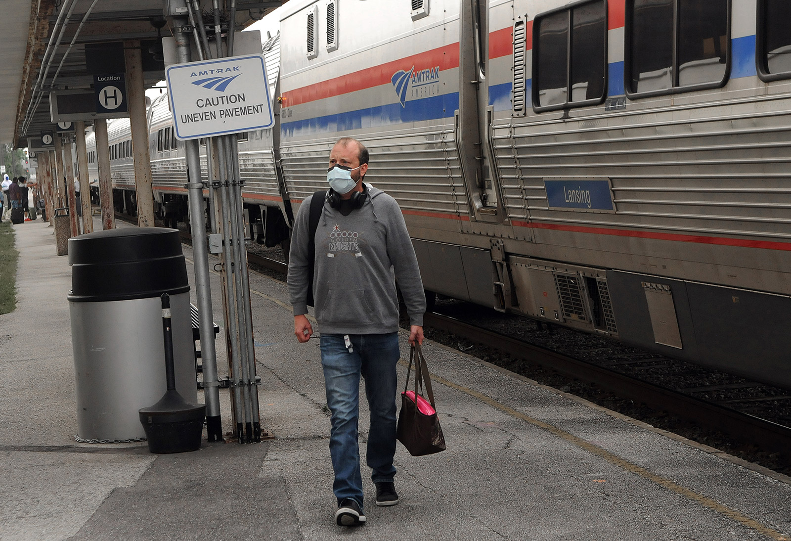 An Amtrak passenger arrives in Orlando, Florida, on April 15.