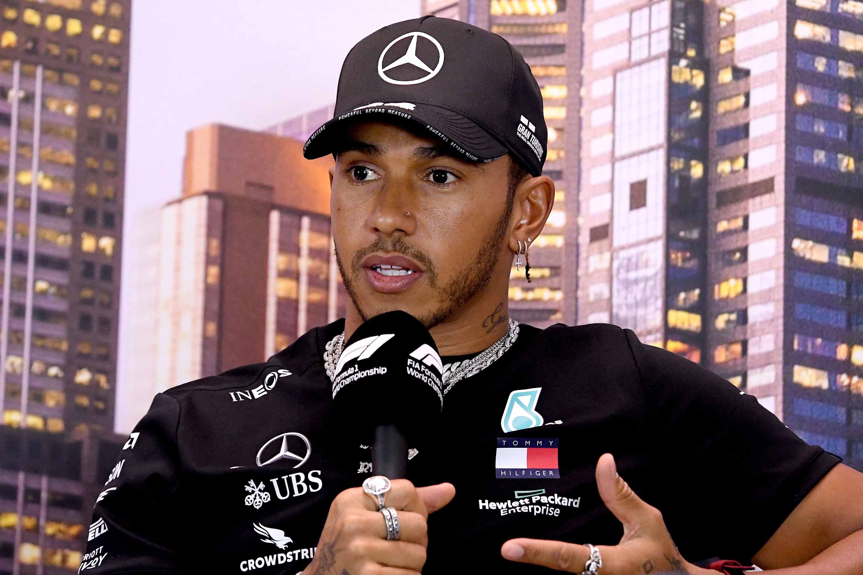 Lewis Hamilton attends a press conference ahead of the Formula One Australian Grand Prix in Melbourne on Thursday.