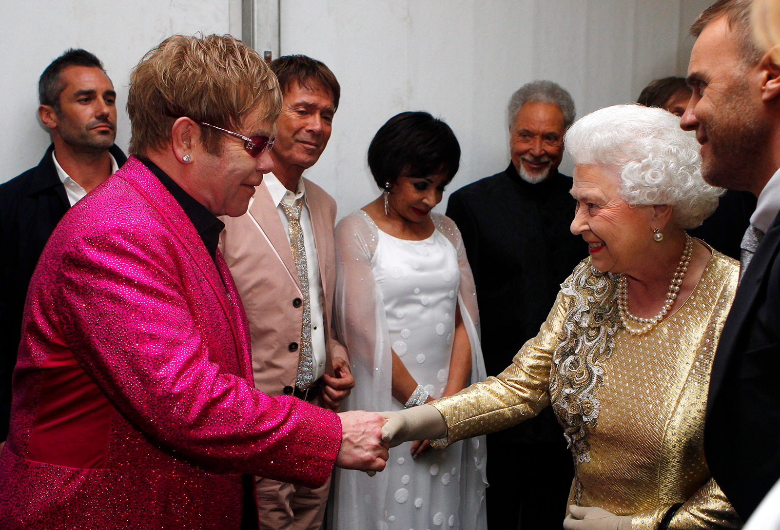 Queen Elizabeth meets with singer Elton John in London on June 4, 2012.