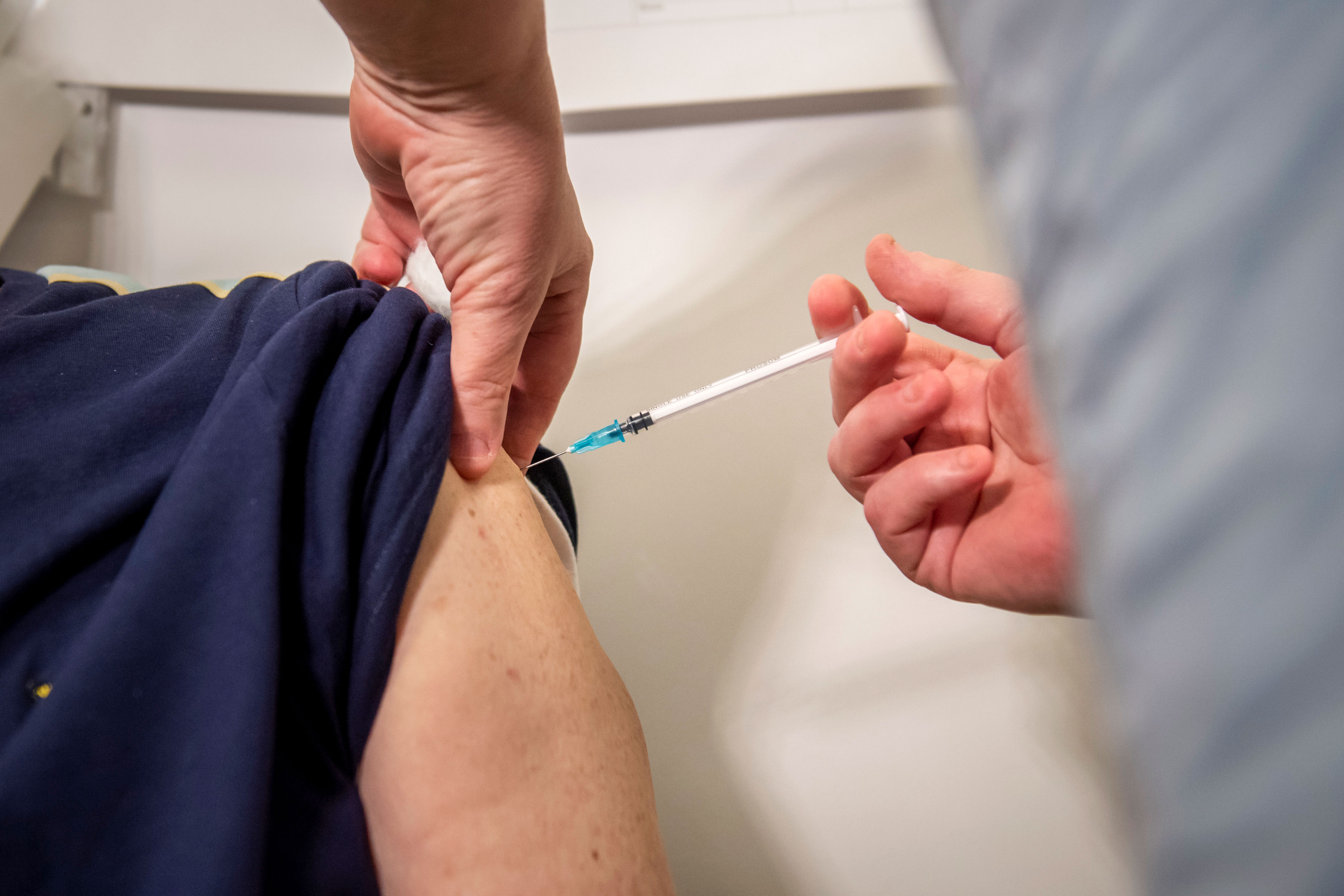 A person receives the Pfizer/BioNTech Covid-19 vaccine on January 11 in Oldham, England.